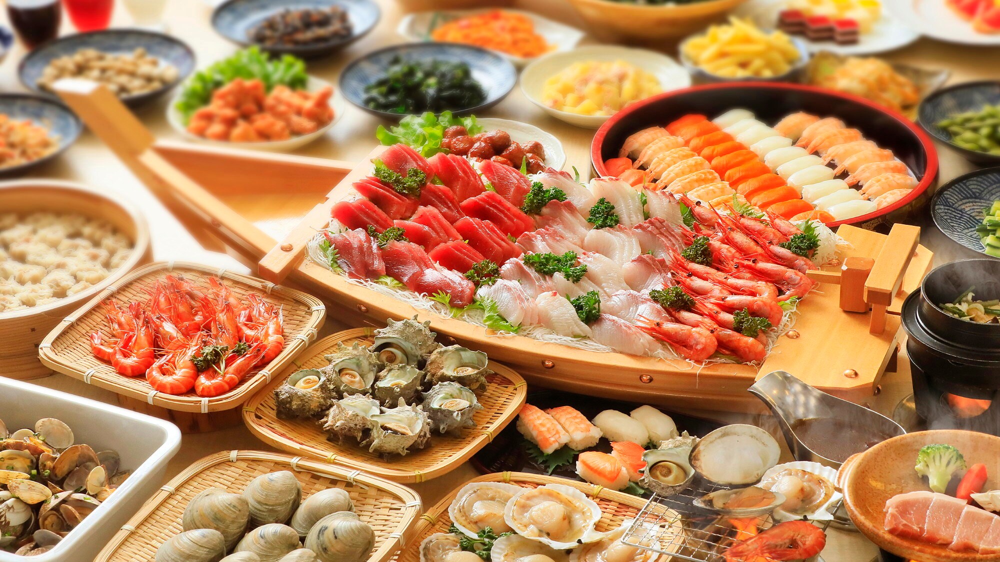 A Japanese and Western buffet where you can enjoy a wide range of dishes from seafood, sushi, and seasonal items to sweets and items popular with children *Example