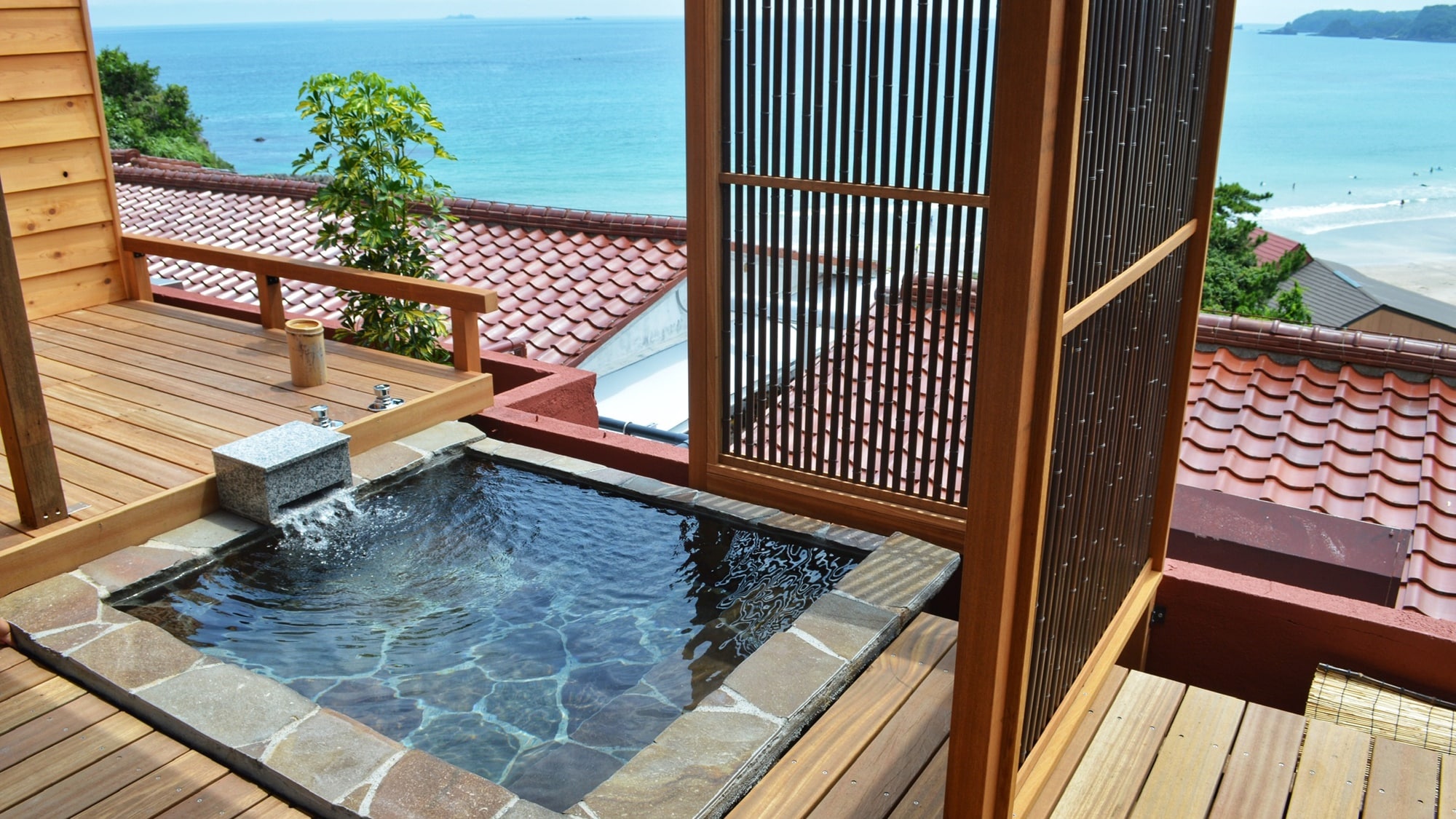 Western-style room with private open-air bath overlooking the sea from the open-air bath in Room 308