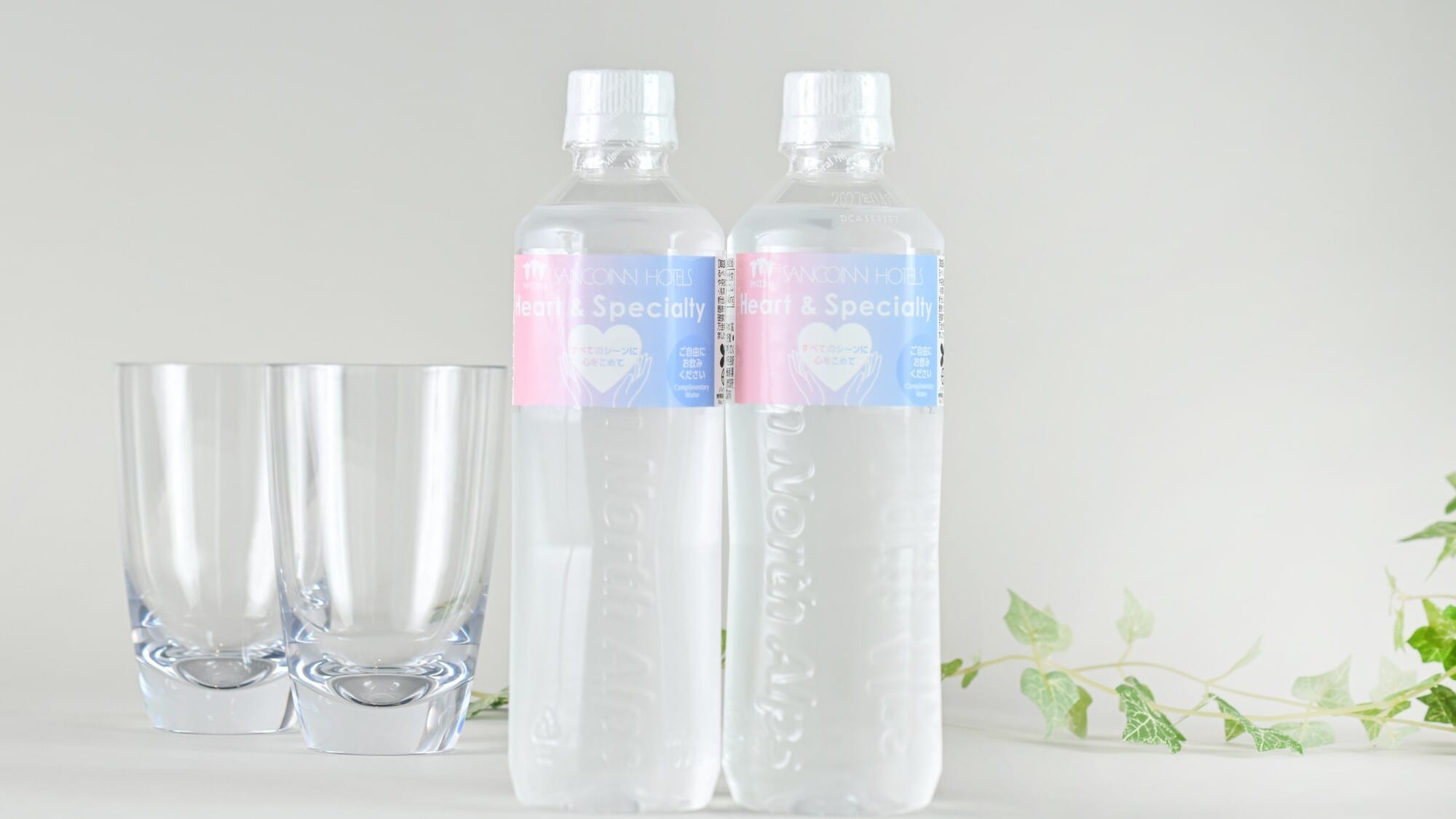 Mineral water (room temperature) is provided in the room.