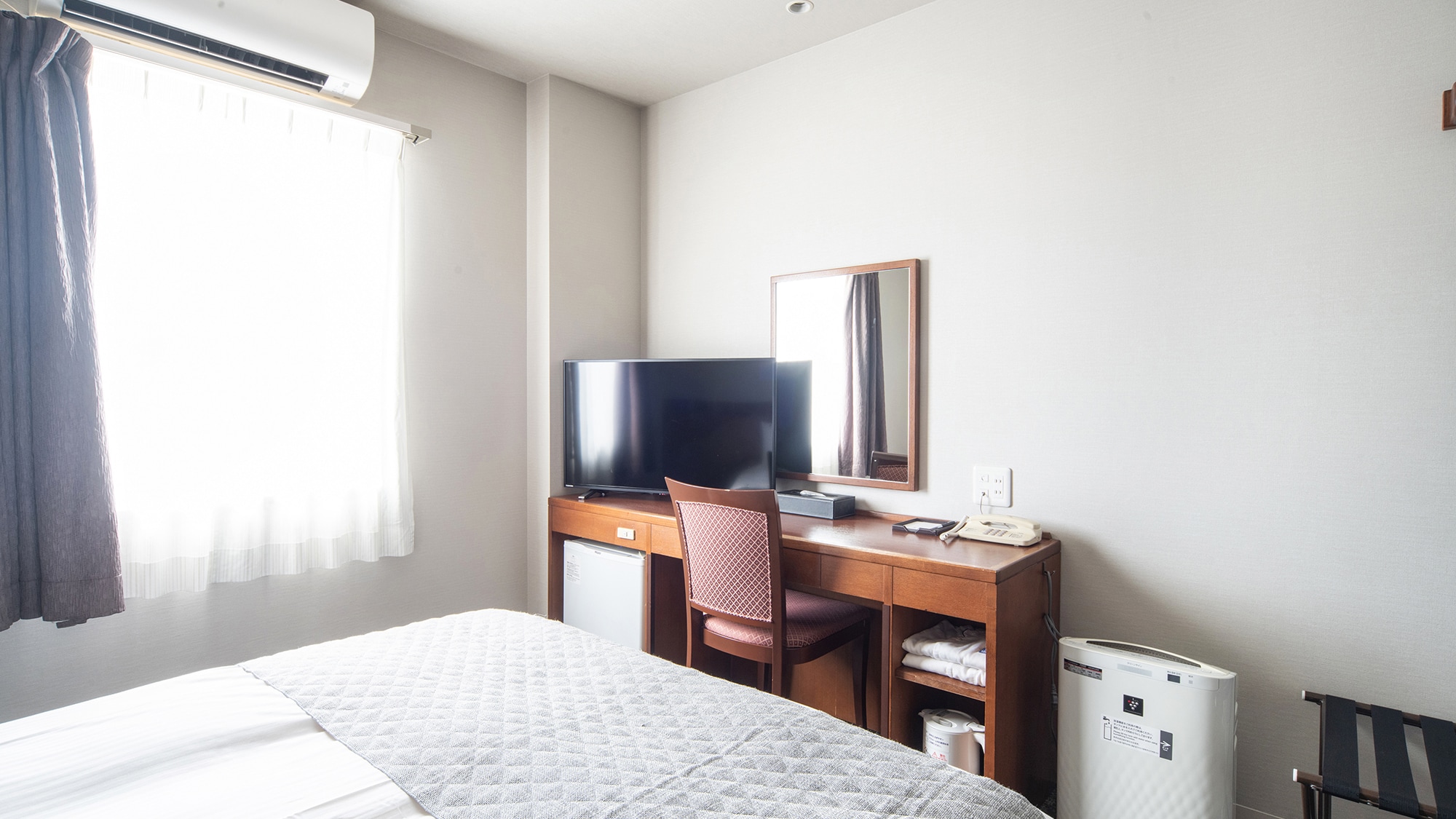 The spacious desk has a 40-inch TV!