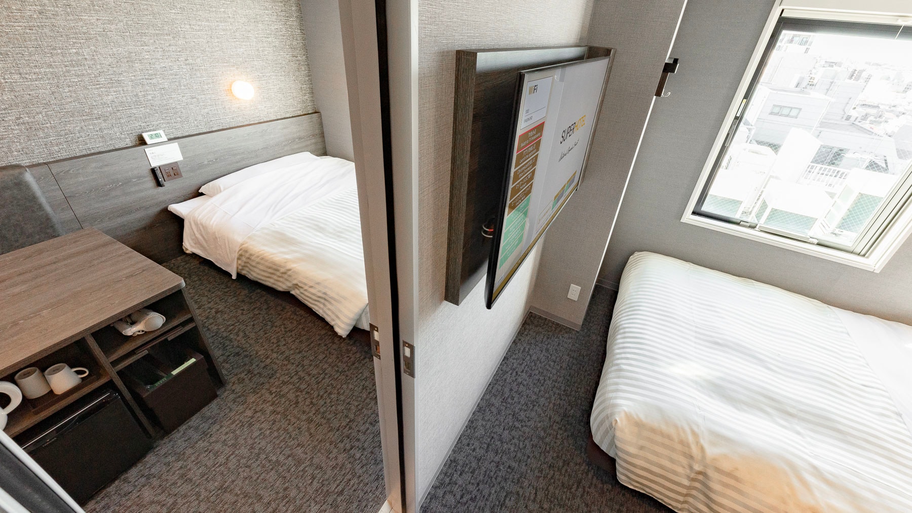This room has two rooms with a door between them.