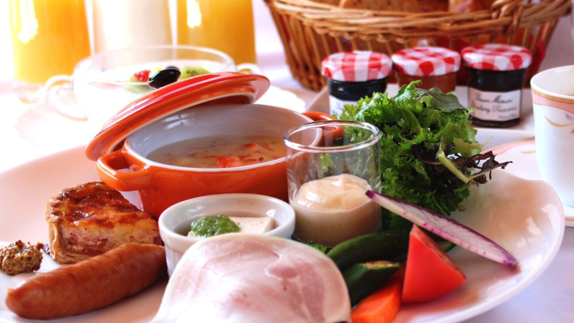 An OPA-style breakfast boasting fresh vegetables and homemade bread!