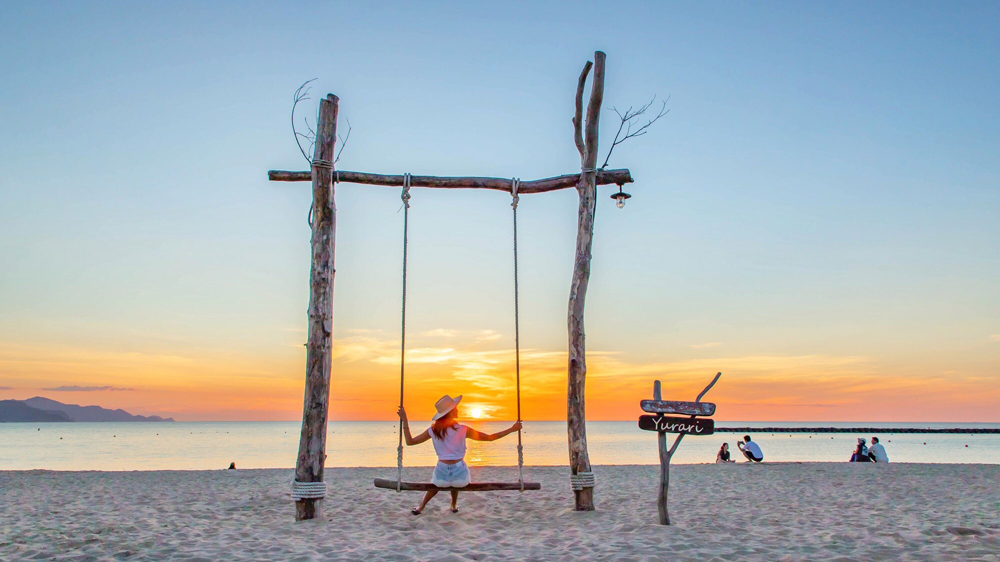 Beach Swing Yurari, spot foto matahari terbenam yang populer di Urahama