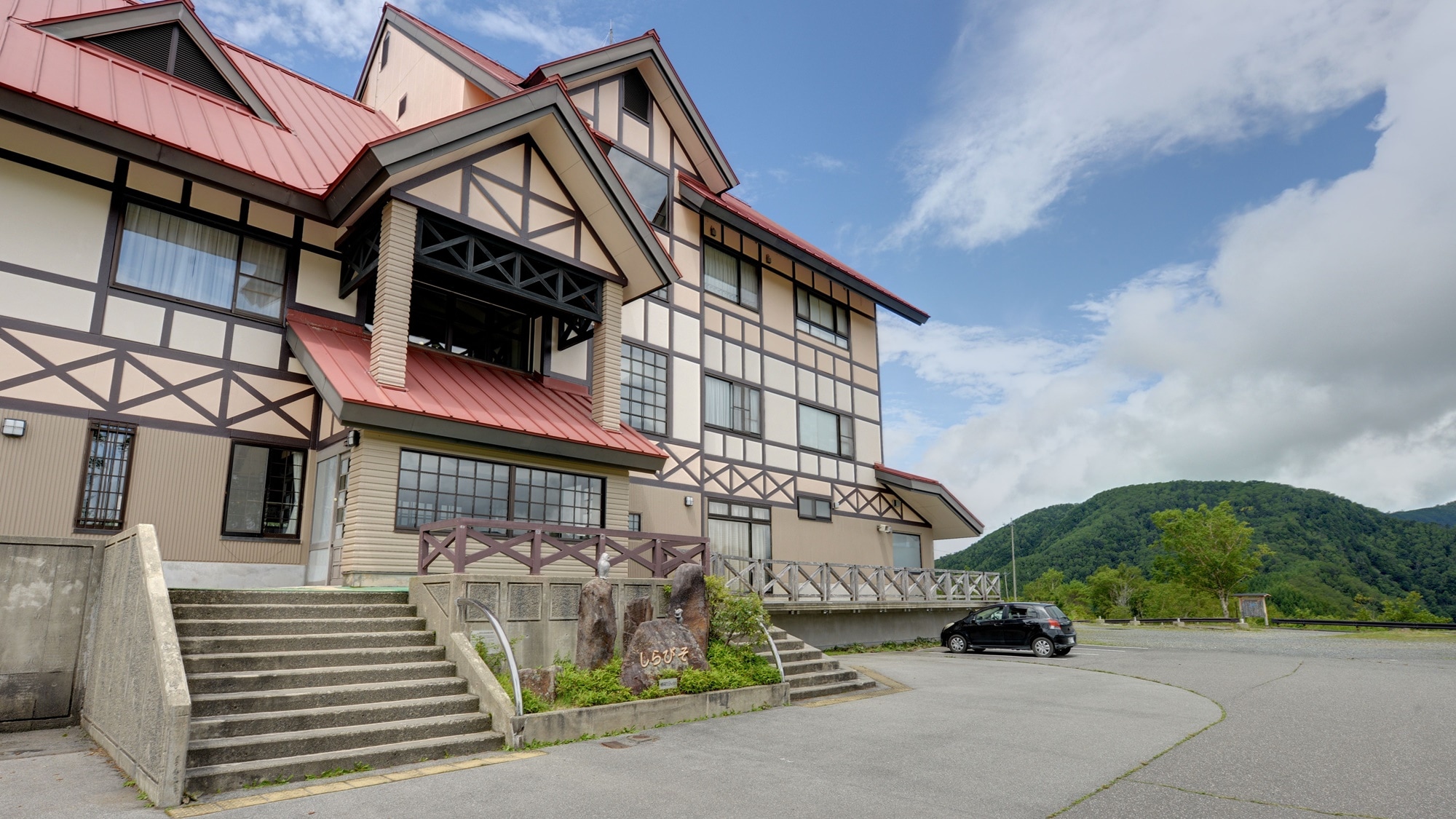 *Exterior: A hotel with a spectacular view of the Alps