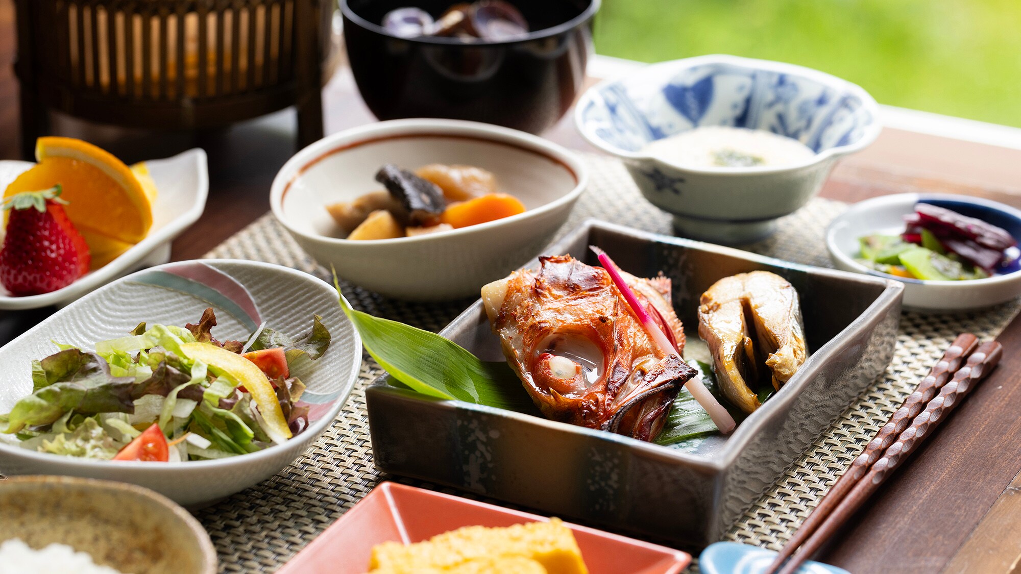 Enjoy a breakfast of fresh grilled fish and local ingredients while looking out over Lake Notoro...