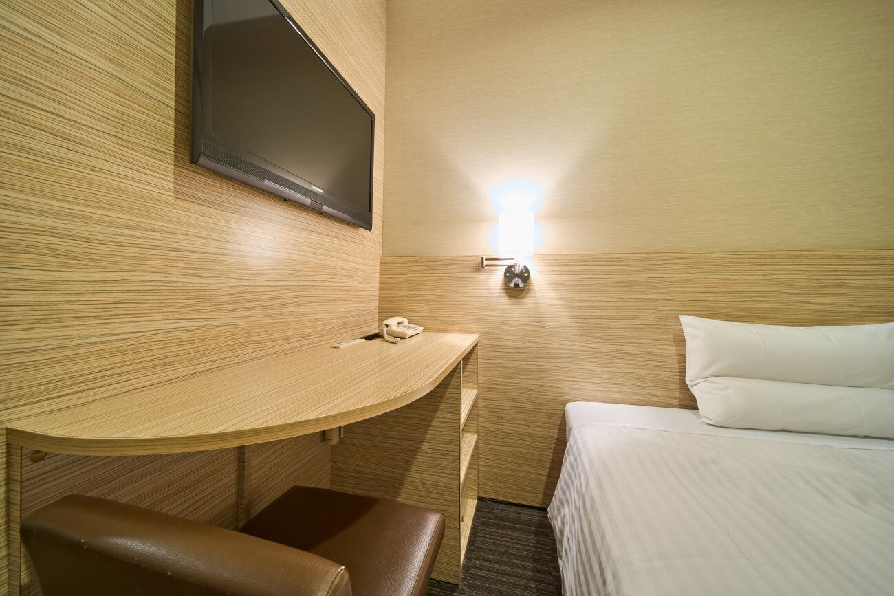 Kamar Single A (12m² / lebar tempat tidur 140cm)