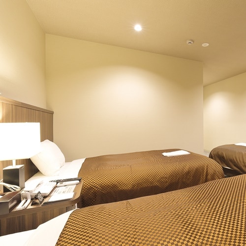 Kamar Tiga Orang