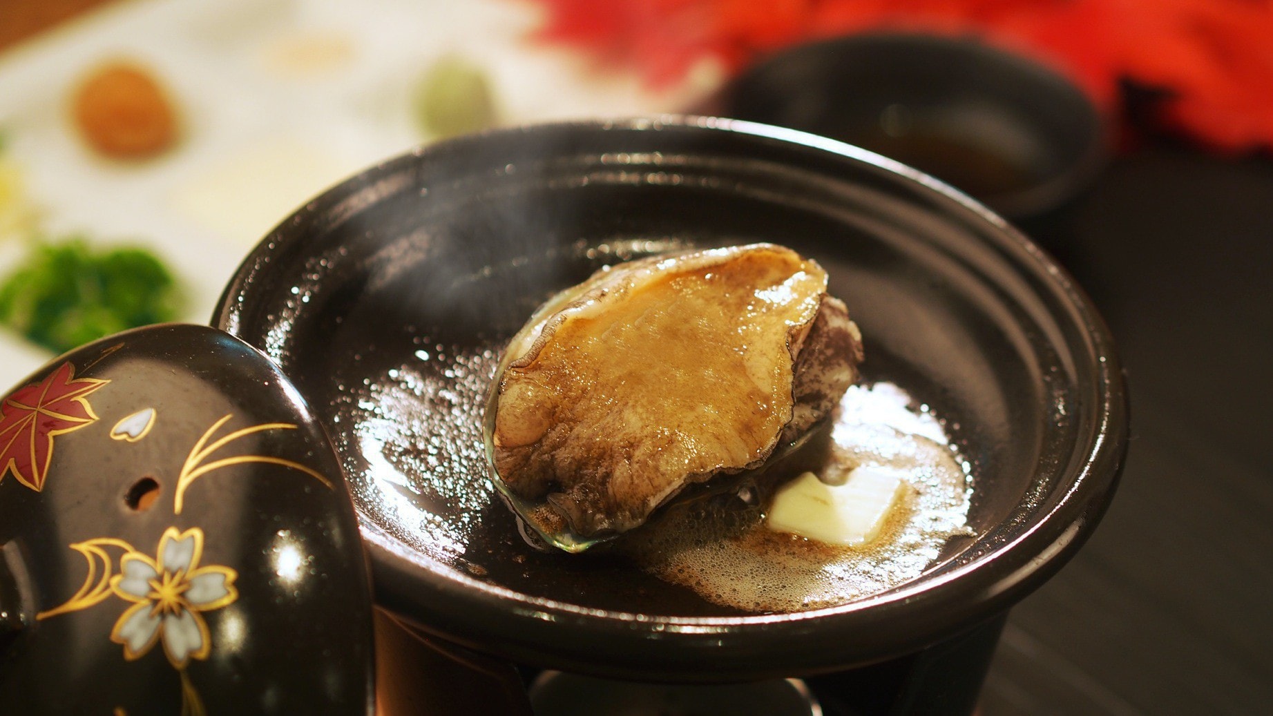 Abalone grilled on a ceramic plate