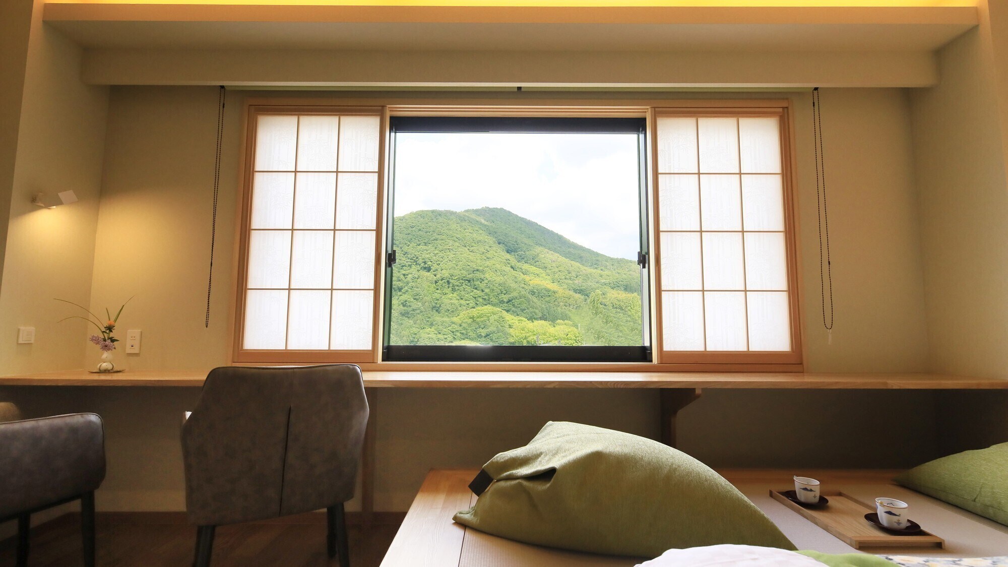 [Renovated West Wing Guest Rooms] The West Wing offers a view of the lush mountains.