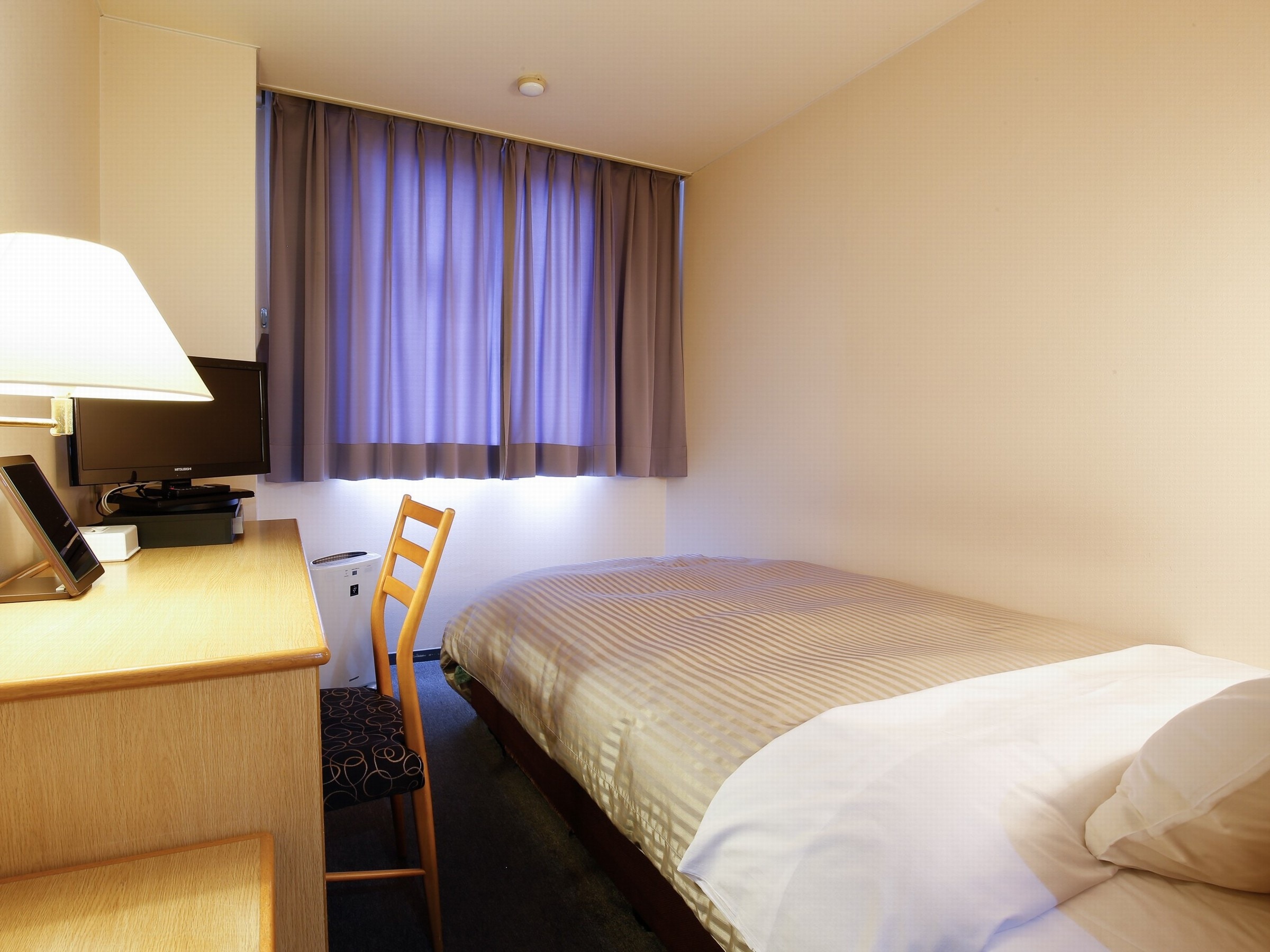 New Wing Single Room - Example of guest room