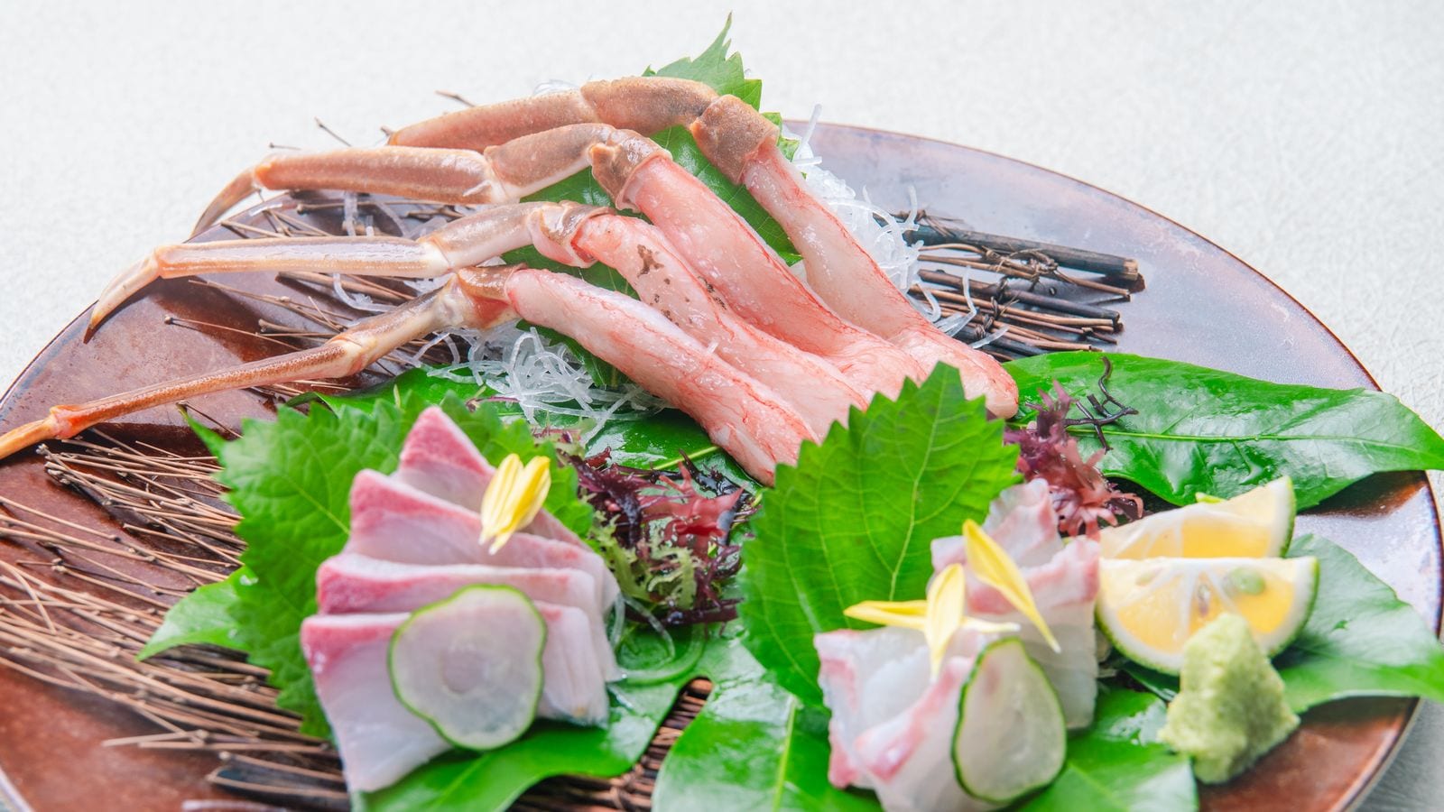 Crab sashimi and local fish platter (photo shows a serving for two)