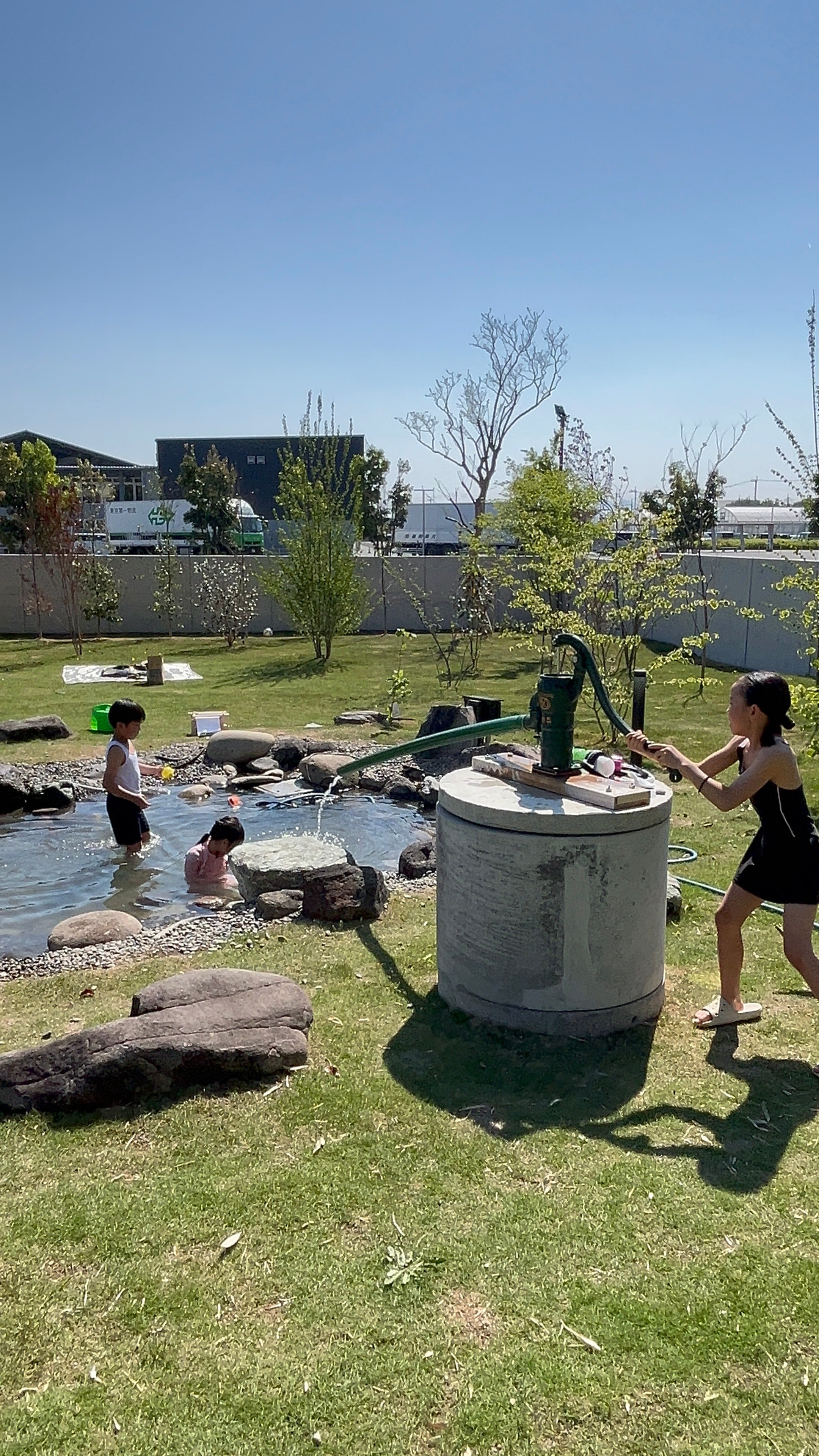 Playing in the splash pool