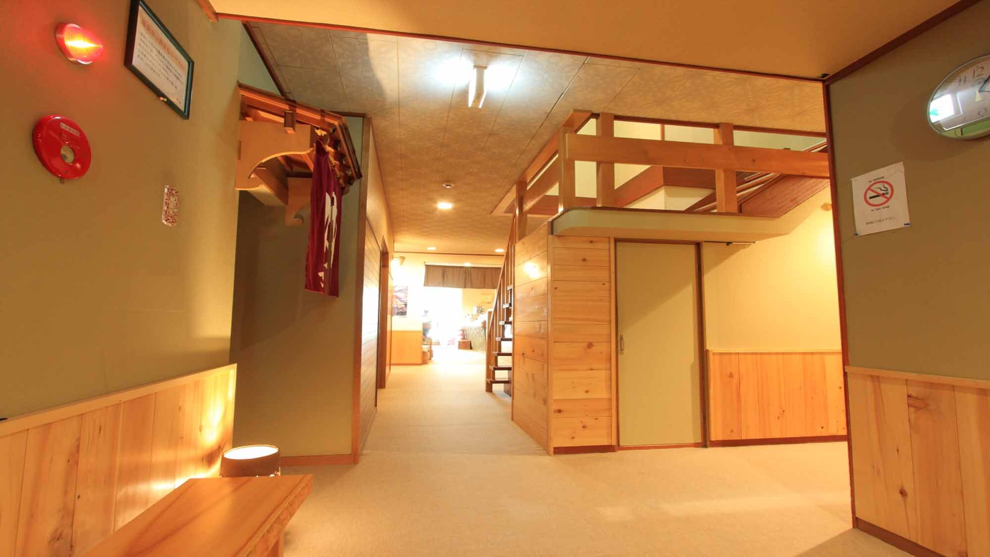 * A break space in front of the large communal bath. It is a relaxing spot where you can feel the warmth of wood.