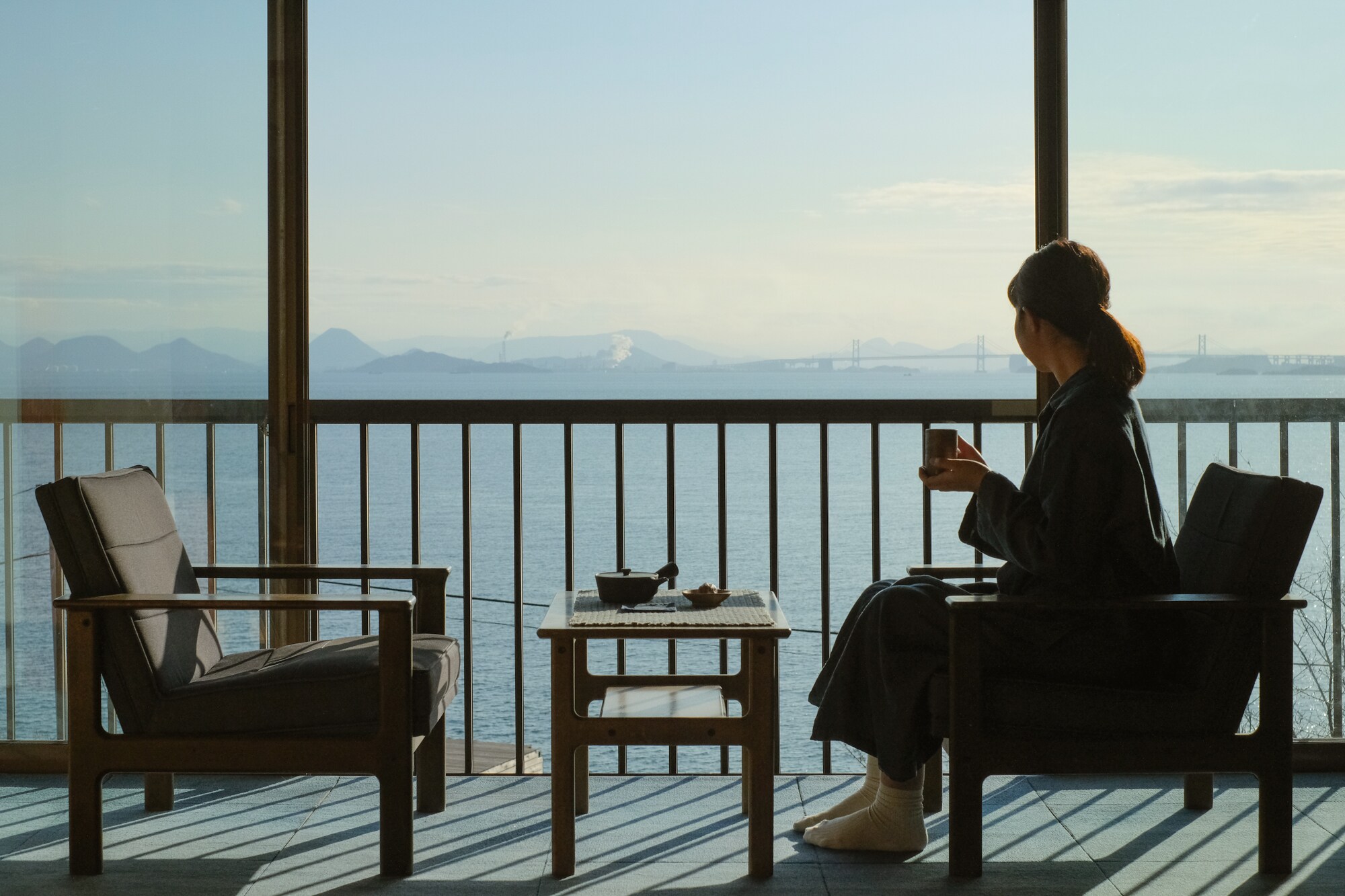 Time to sit on the denim sofa and look at the sea.
