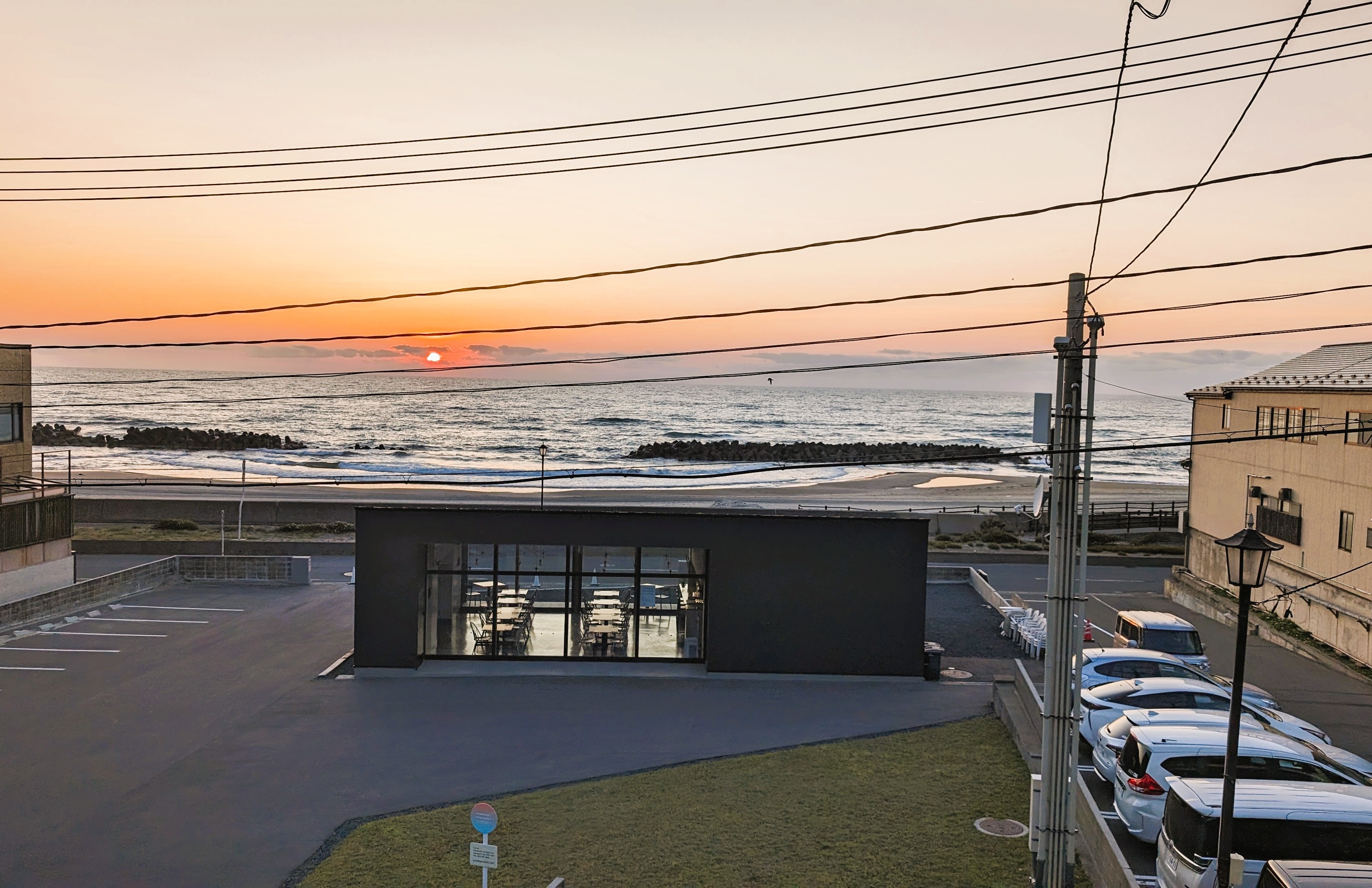View from the Japanese-style room facing the sea: 100-year-old kitchen
