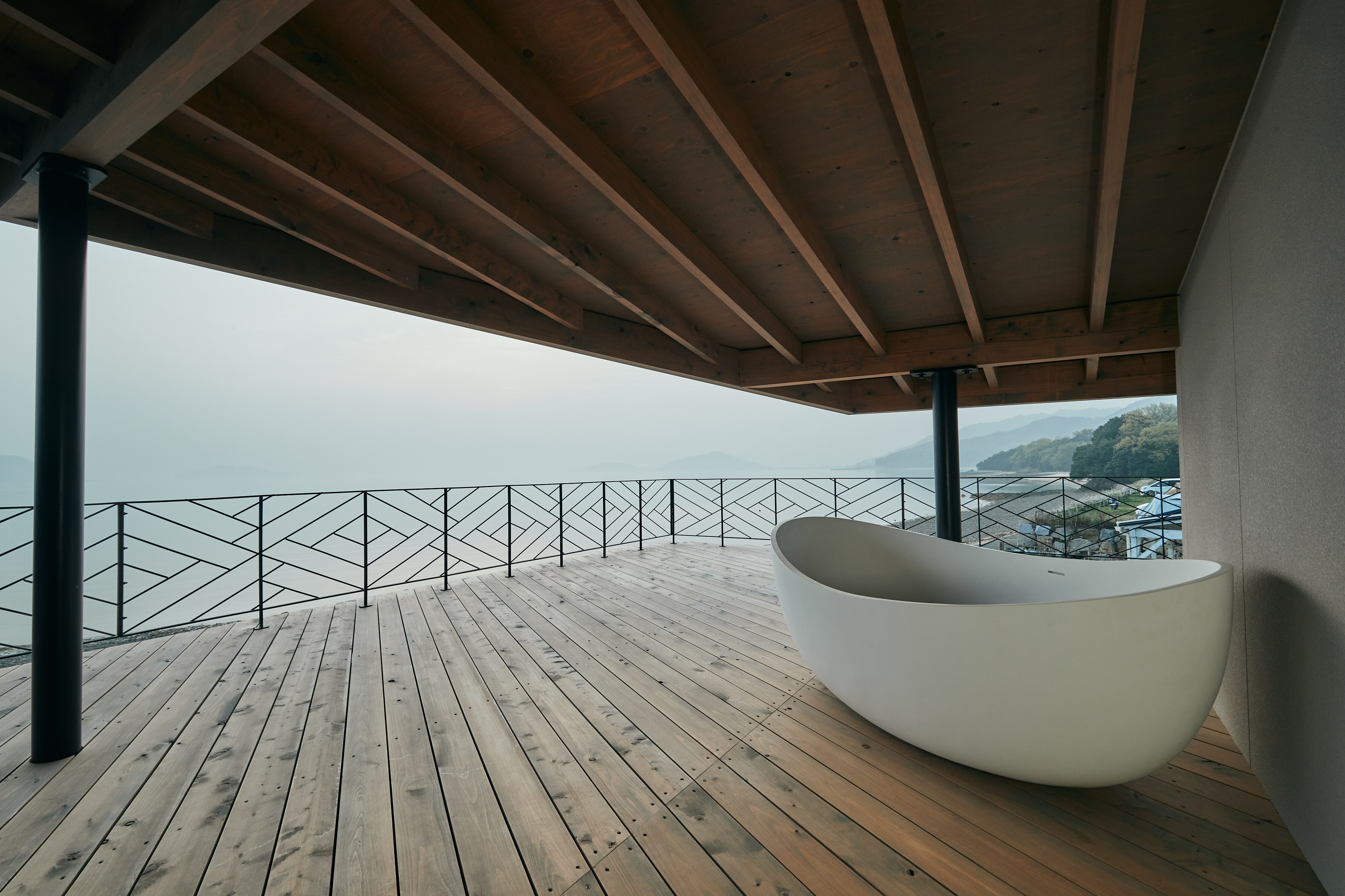 Second floor wooden deck bathtub