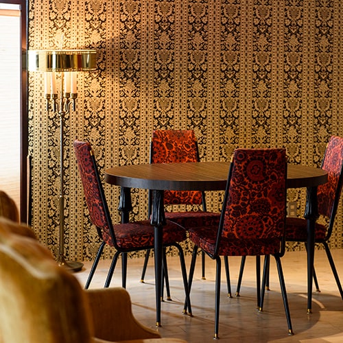 "Rockside" Dining area with vintage furniture.