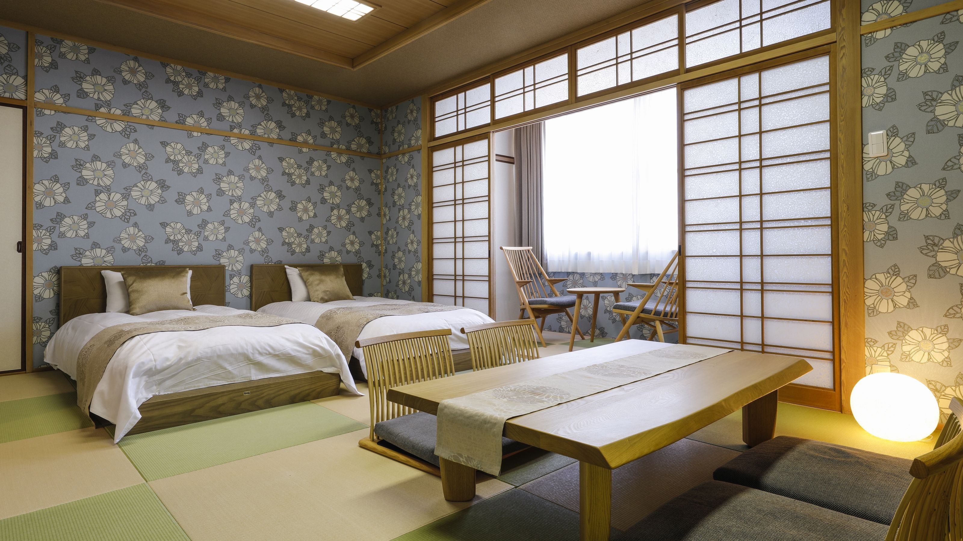 * Kamar bergaya Jepang DX Contoh: Tempat tidur Simmons ditempatkan di kamar bergaya Jepang yang luas