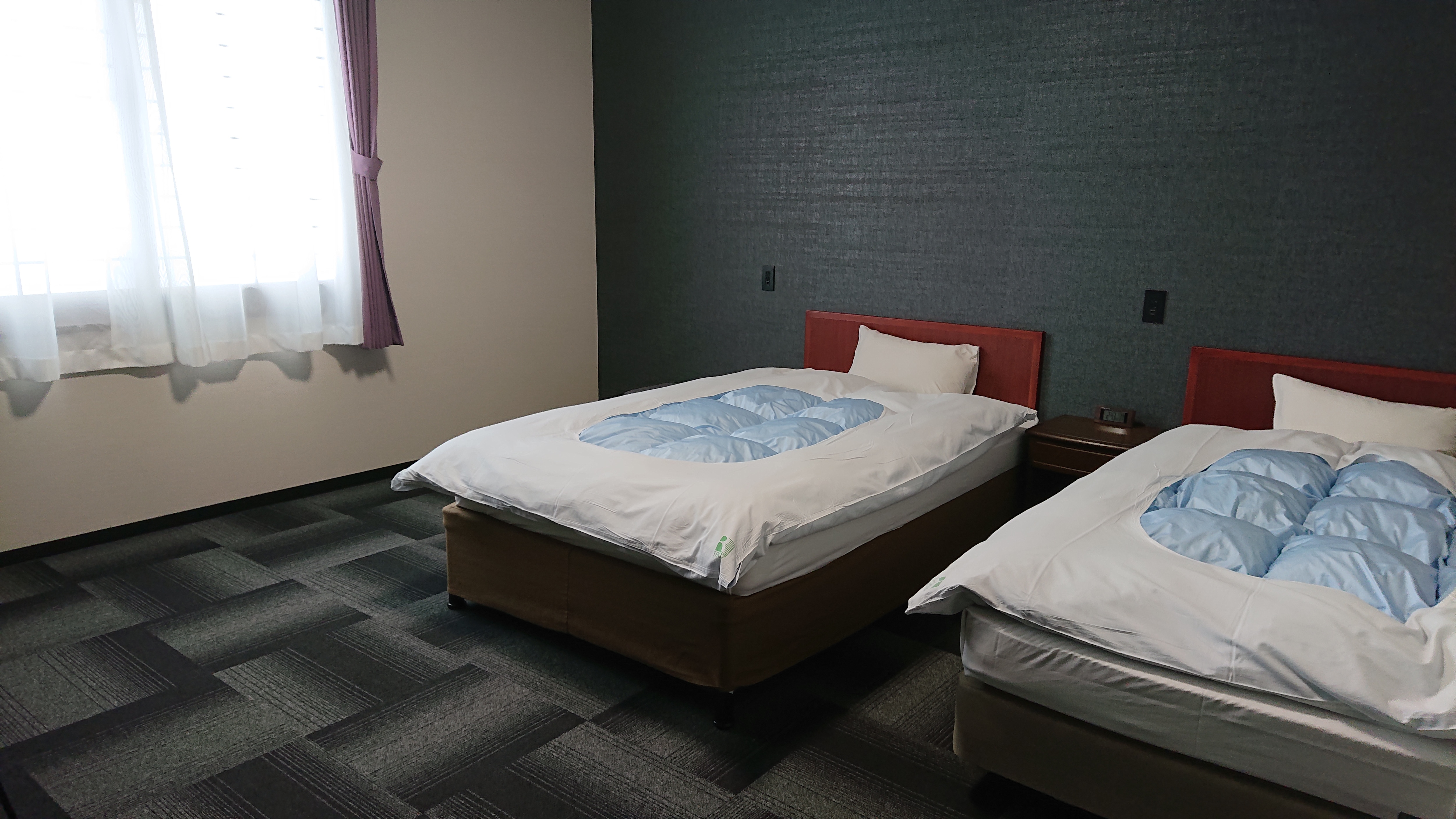 ห้องเตียงคู่พร้อมห้องอาบน้ำ