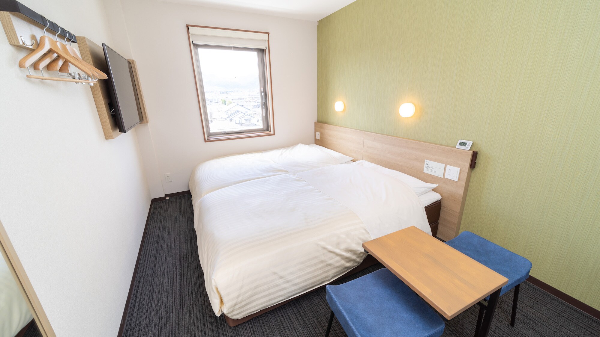 There is ample space for two beds.