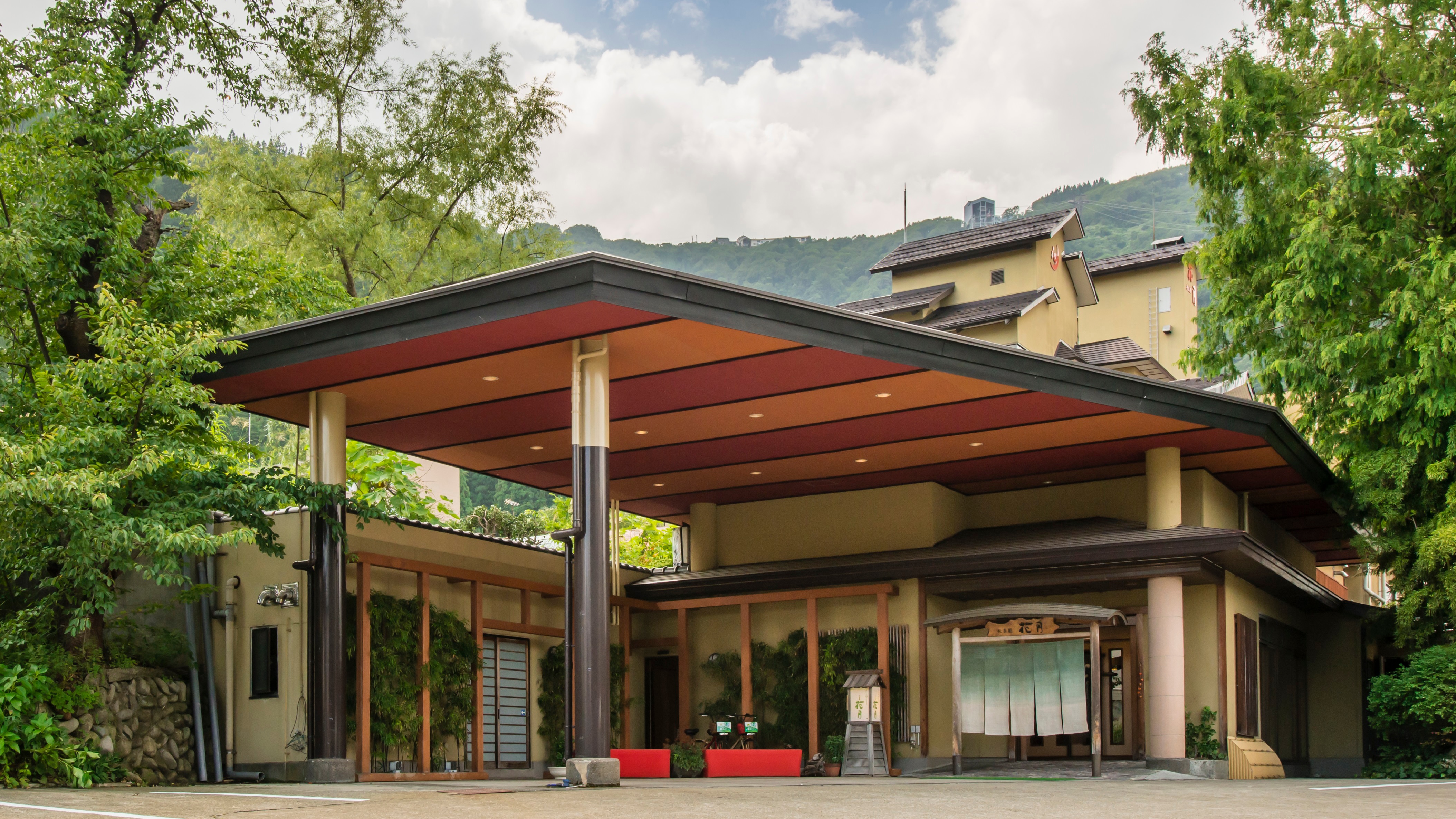 The exterior of the hotel in summer