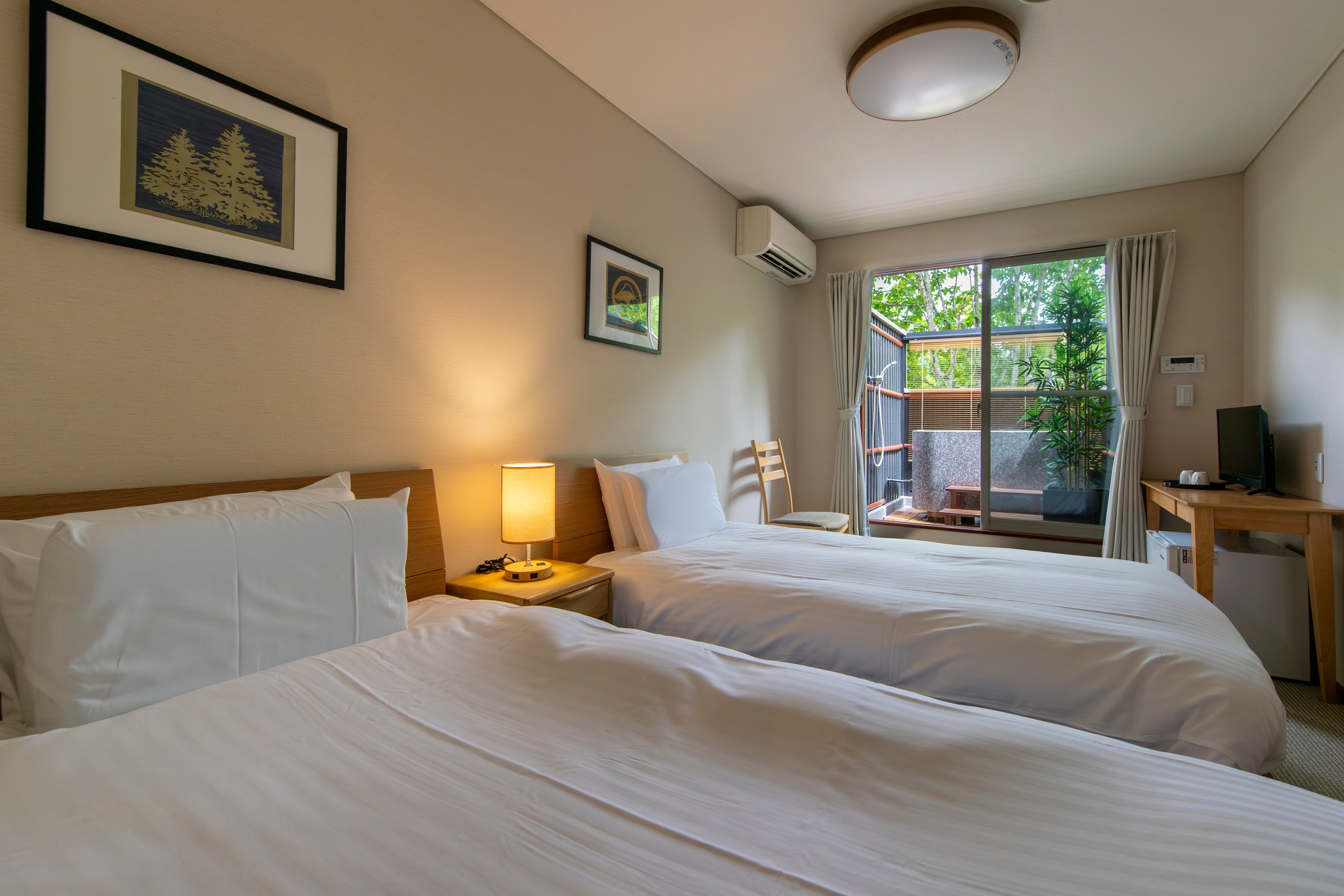 Main building twin room with open-air bath