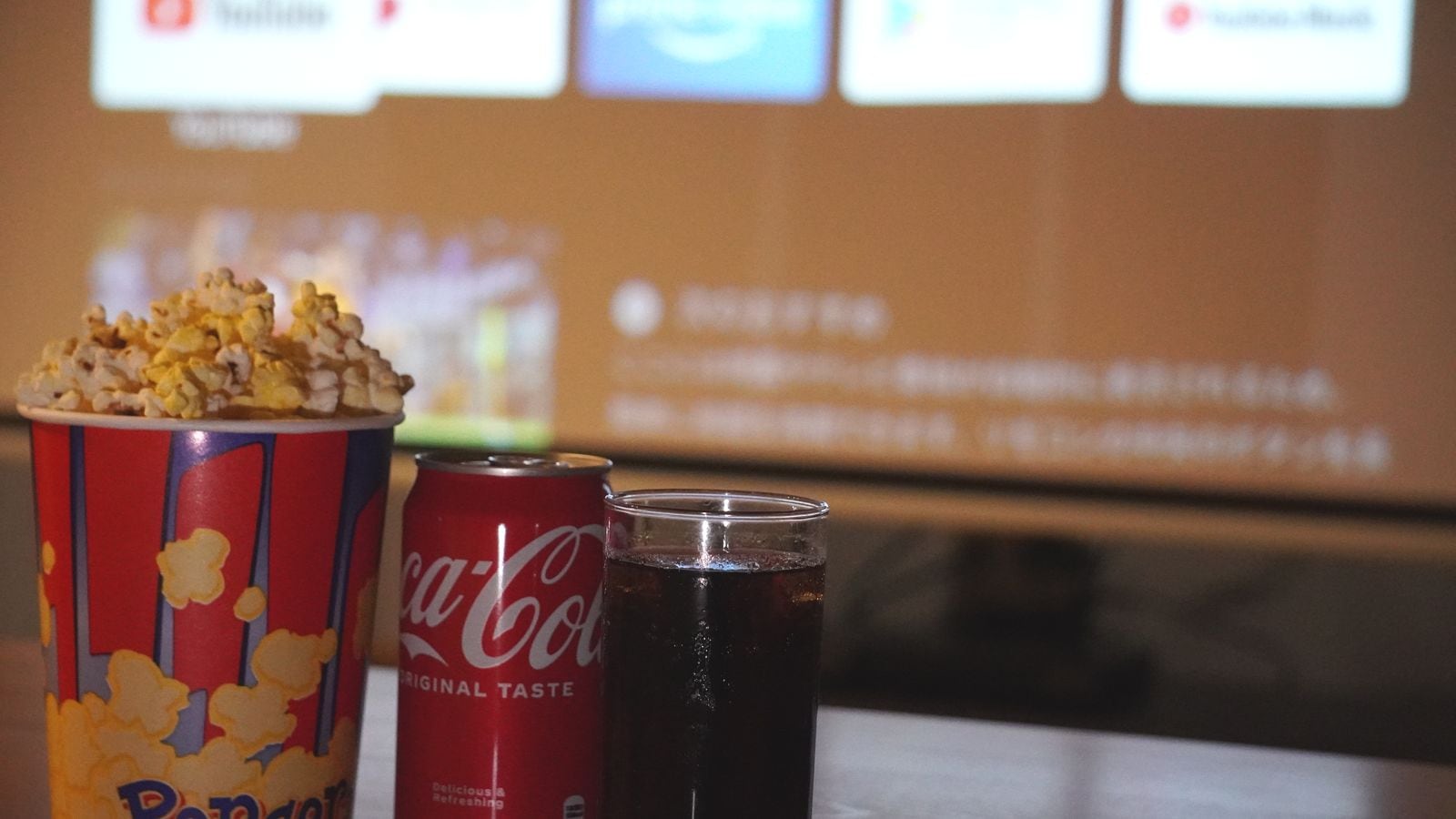 The home theater room comes with popcorn and cola.