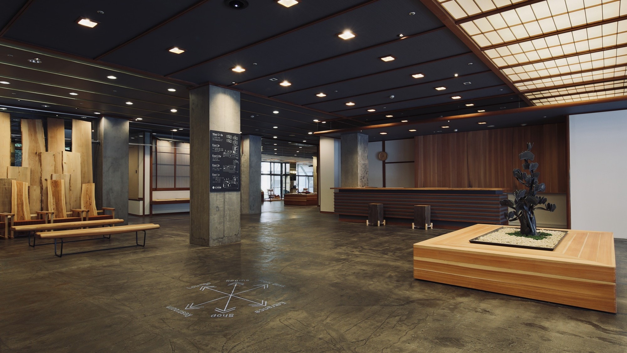 The lobby has an urban atmosphere that makes use of the texture of concrete.