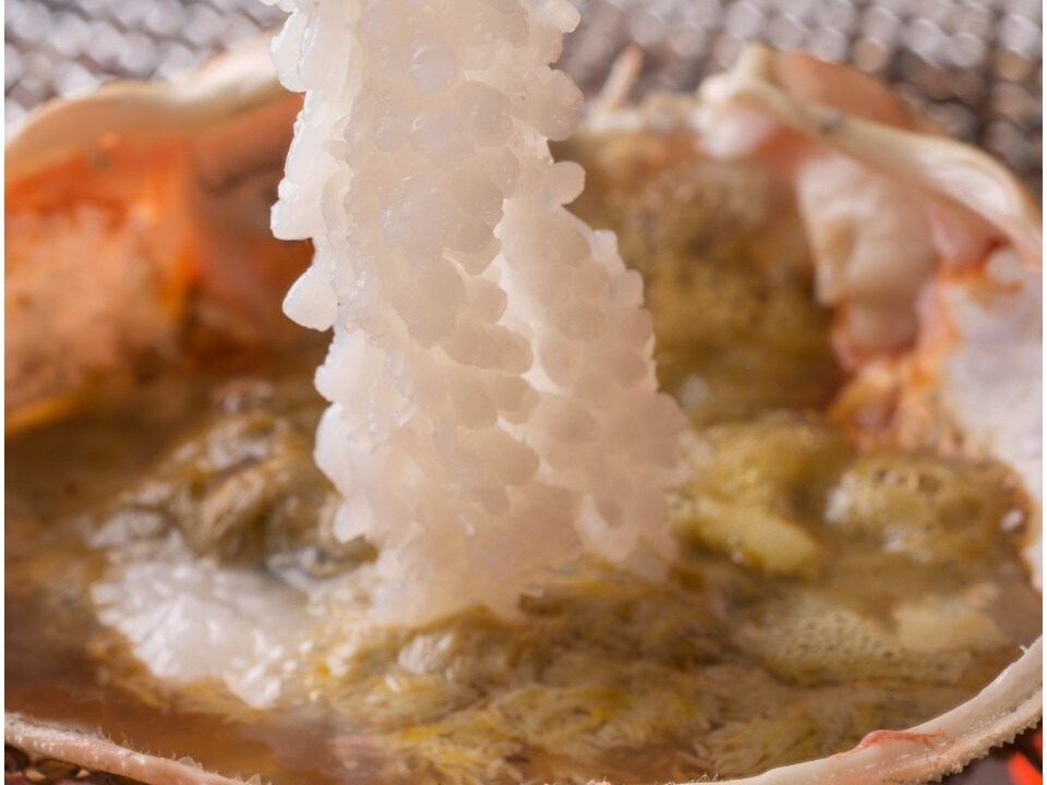 Grilled crab shell with miso paste and crab sashimi