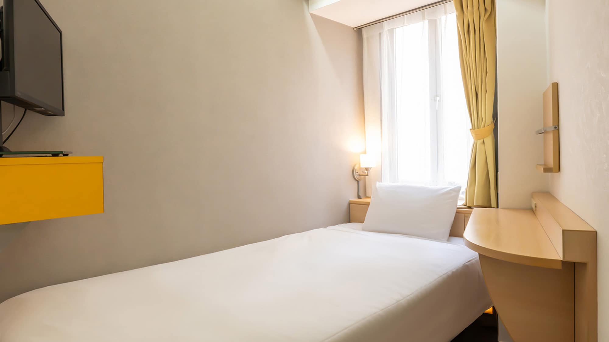 Phòng đơn tiêu chuẩn A (Đã được tân trang) | 9 m² / Sức chứa: 1 người / Chiều rộng giường: 100cm x 1 giường