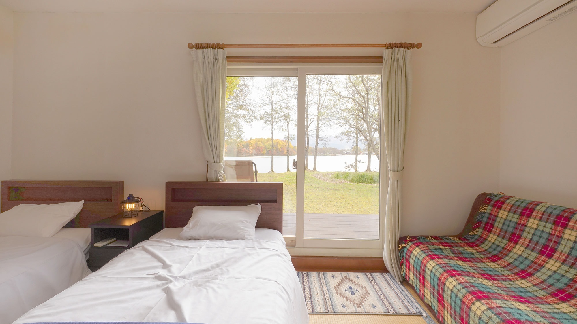 This room has a balcony that leads directly to the garden.