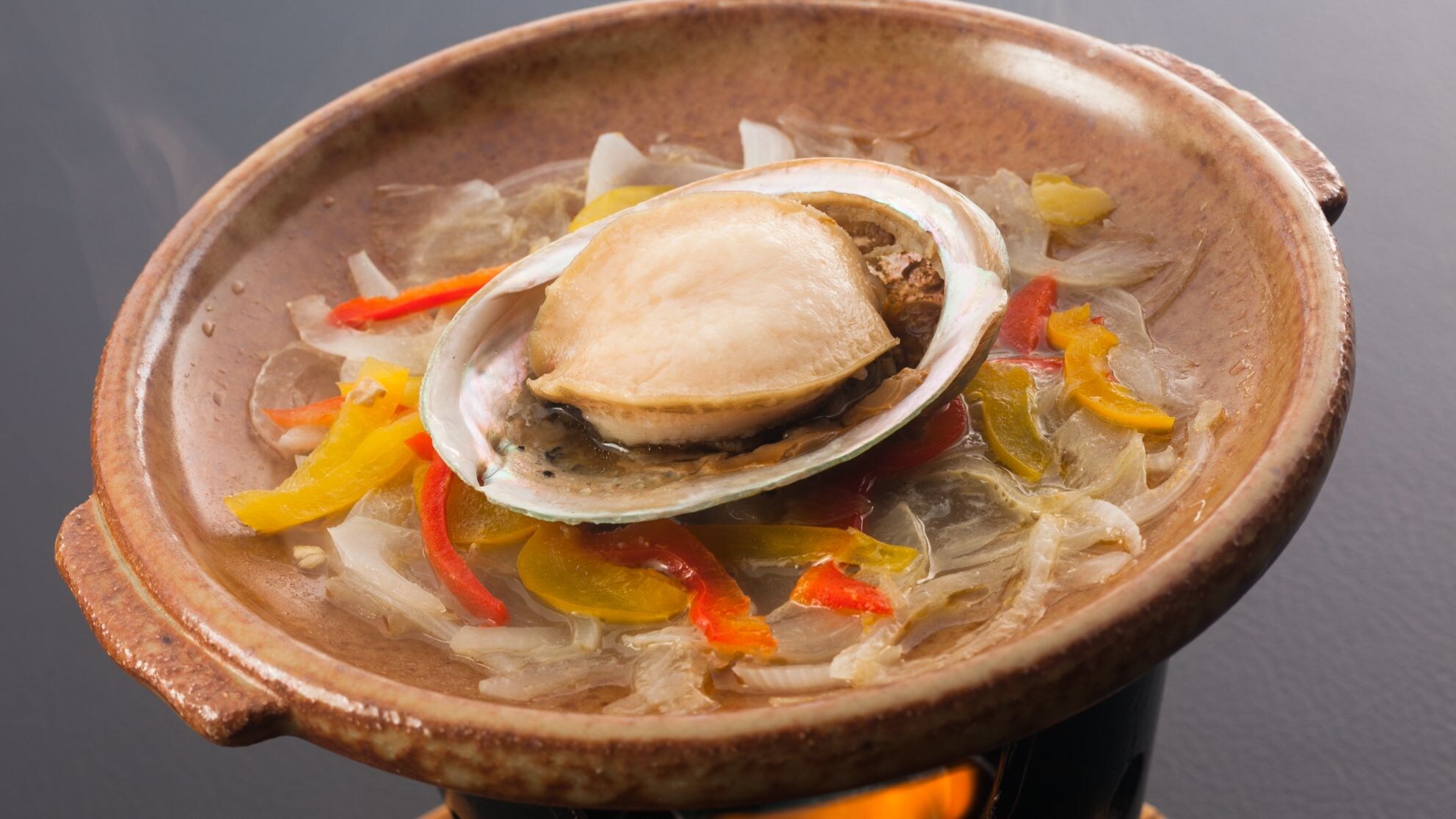 Abalone grilled on a ceramic plate