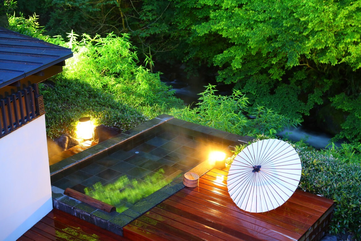 Open-air bath with sleeping bath