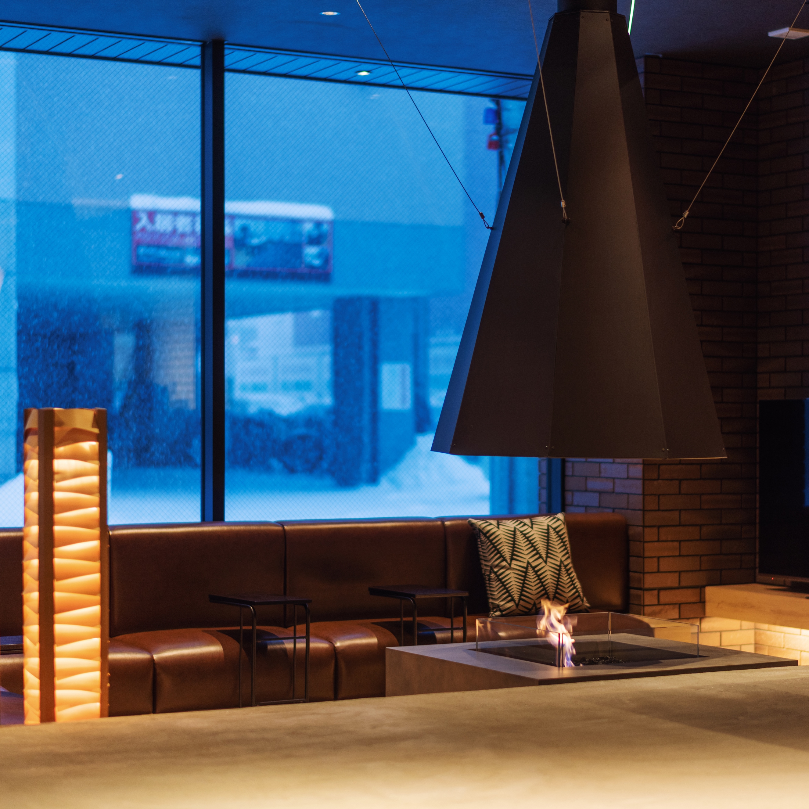 A lounge with a warm fireplace in winter. You can also watch Netflix and Amazon Prime on a large TV.
