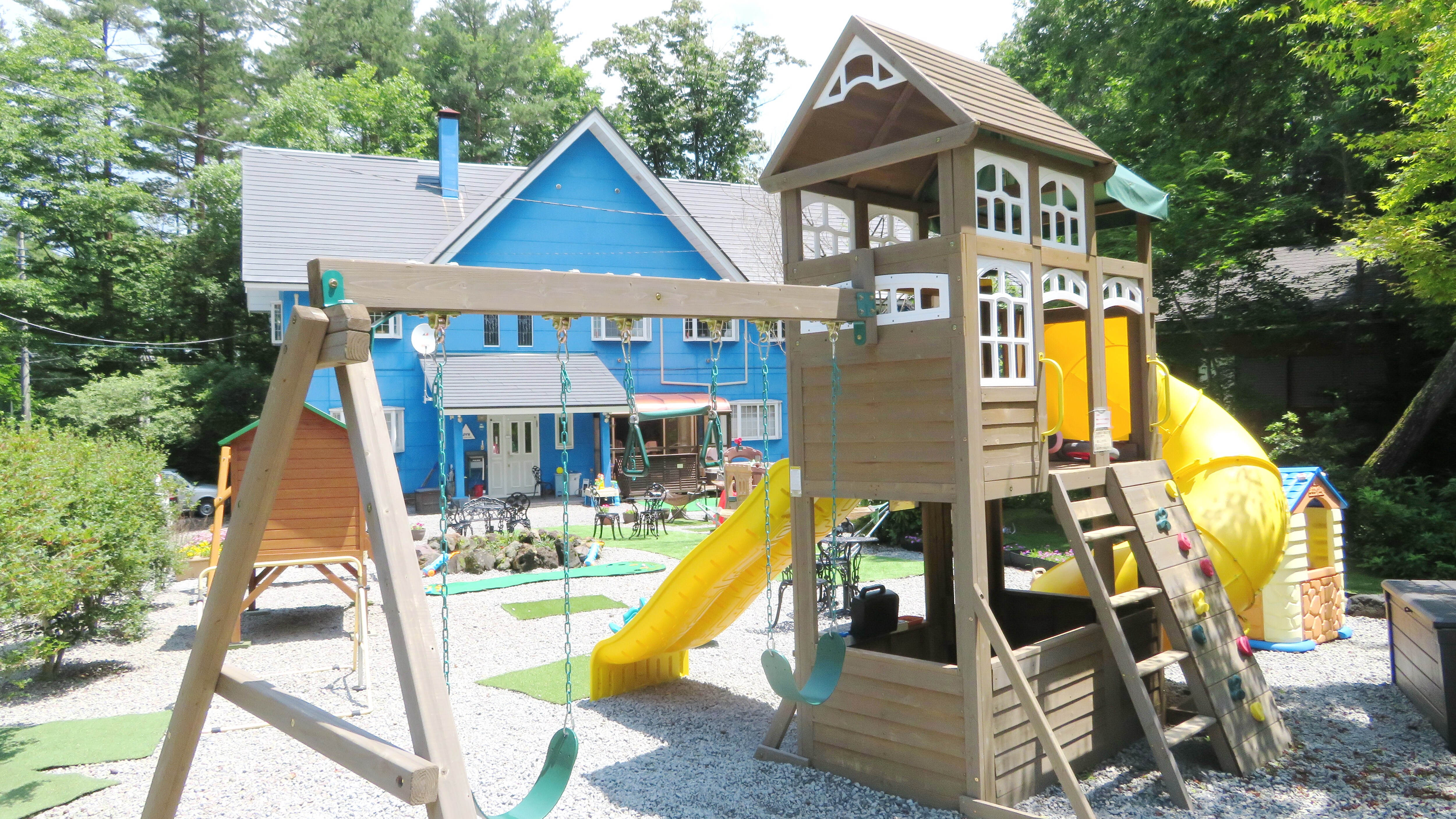 Have fun with the large playground equipment in the garden!