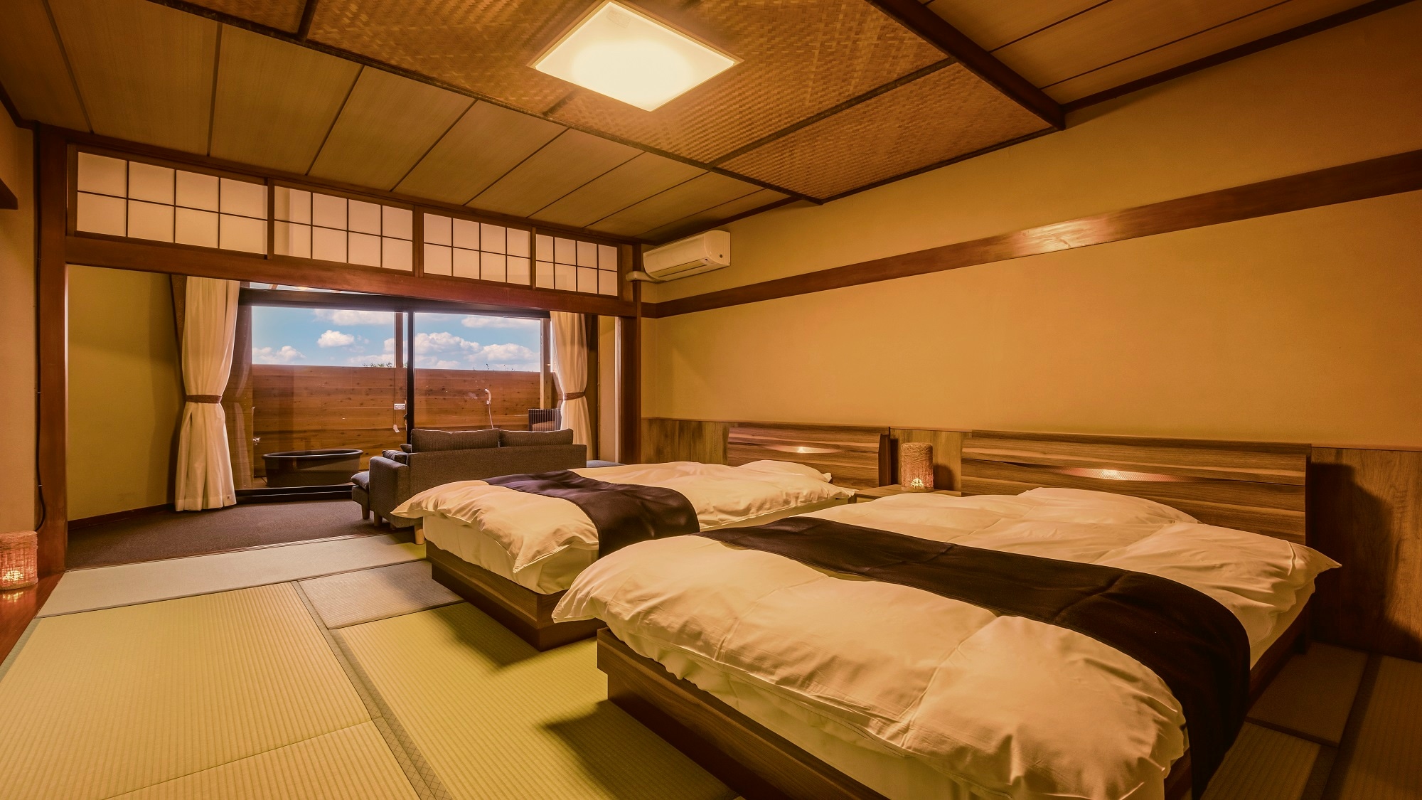 Superior Twin Room with Japanese-style Bed and 12 tatami mats and an open-air bath *Example of a guest room