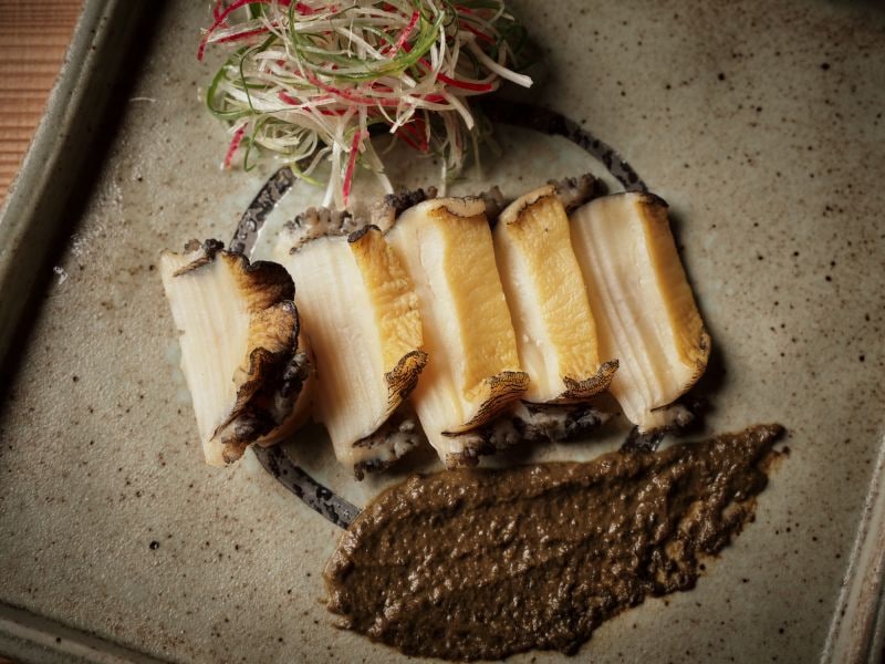 An example of a Kaiseki plan with Yamagata beef steak, blackthroat seaperch, and abalone