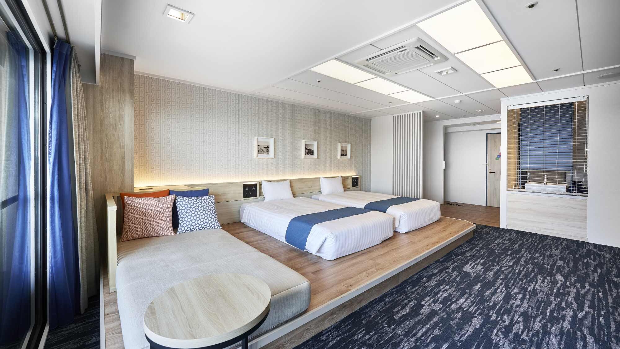 Kamar Twin Deluxe dengan Pemandangan Laut (dengan kamar mandi busa terbuka) untuk 1-4 orang