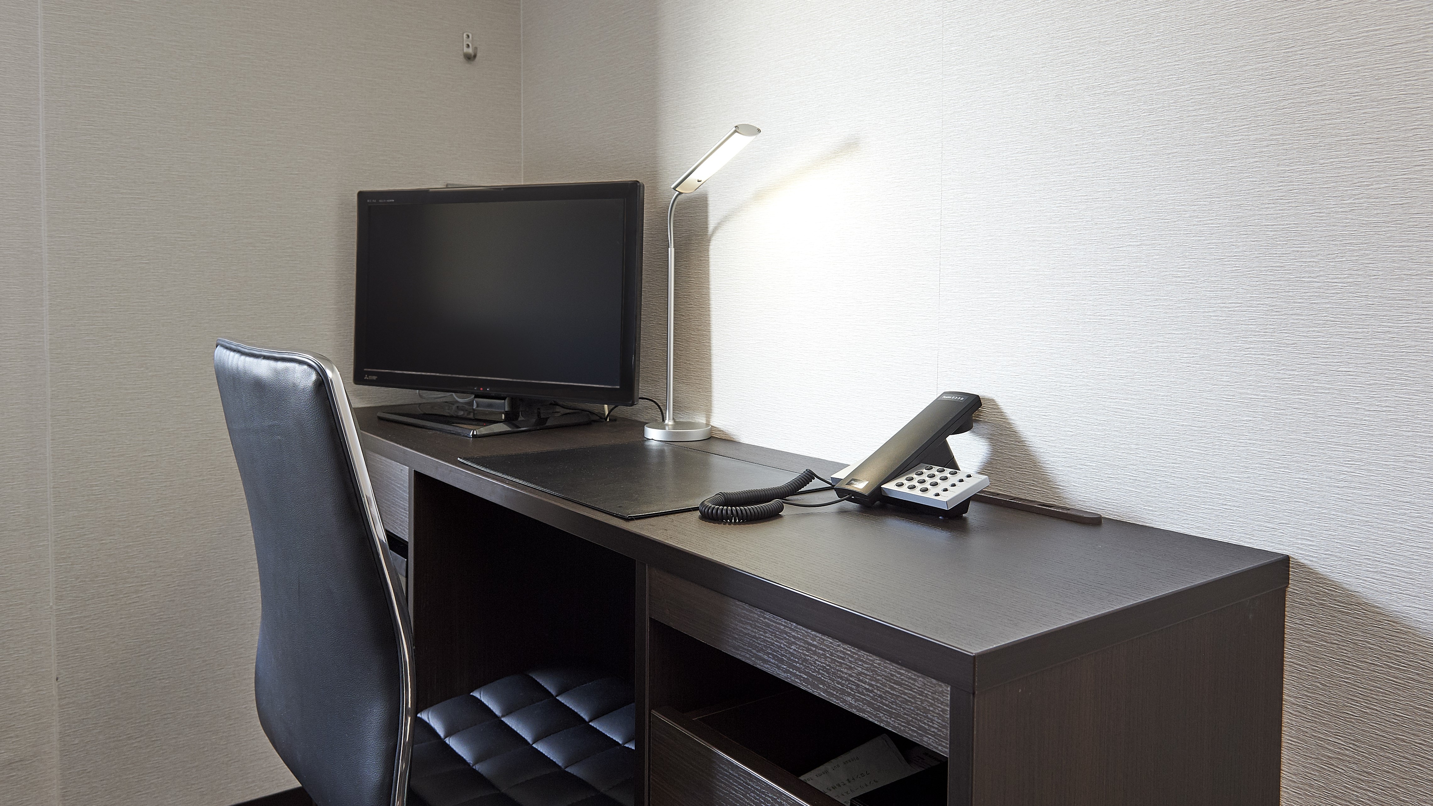 Work desk with standing lamp (example of guest room)