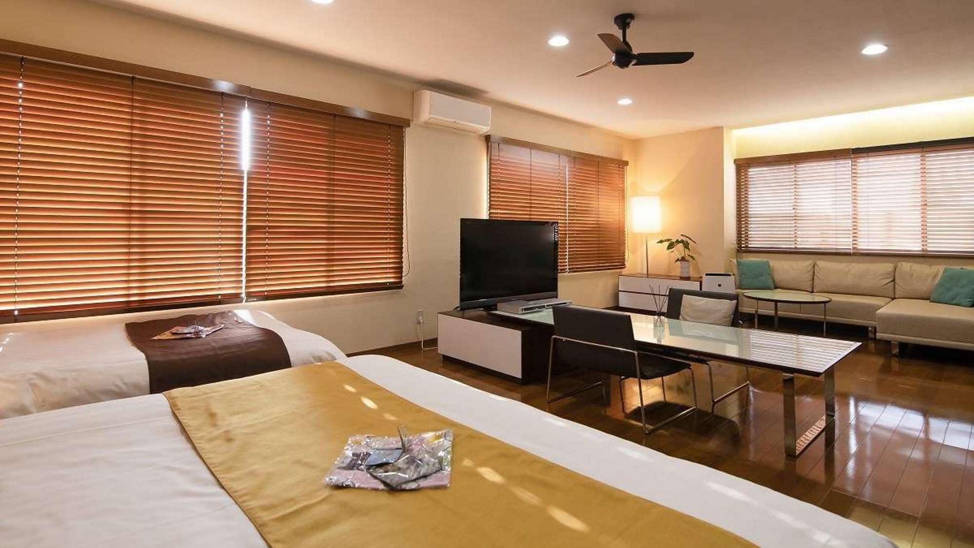 [豪华双床房] 与度假村风格的内饰相协调的房间。