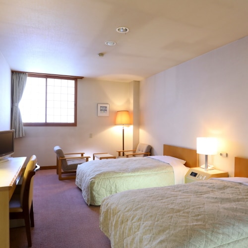 Deluxe Twin Room: Up to 3 people can stay (3rd bed will be used as an extra bed)