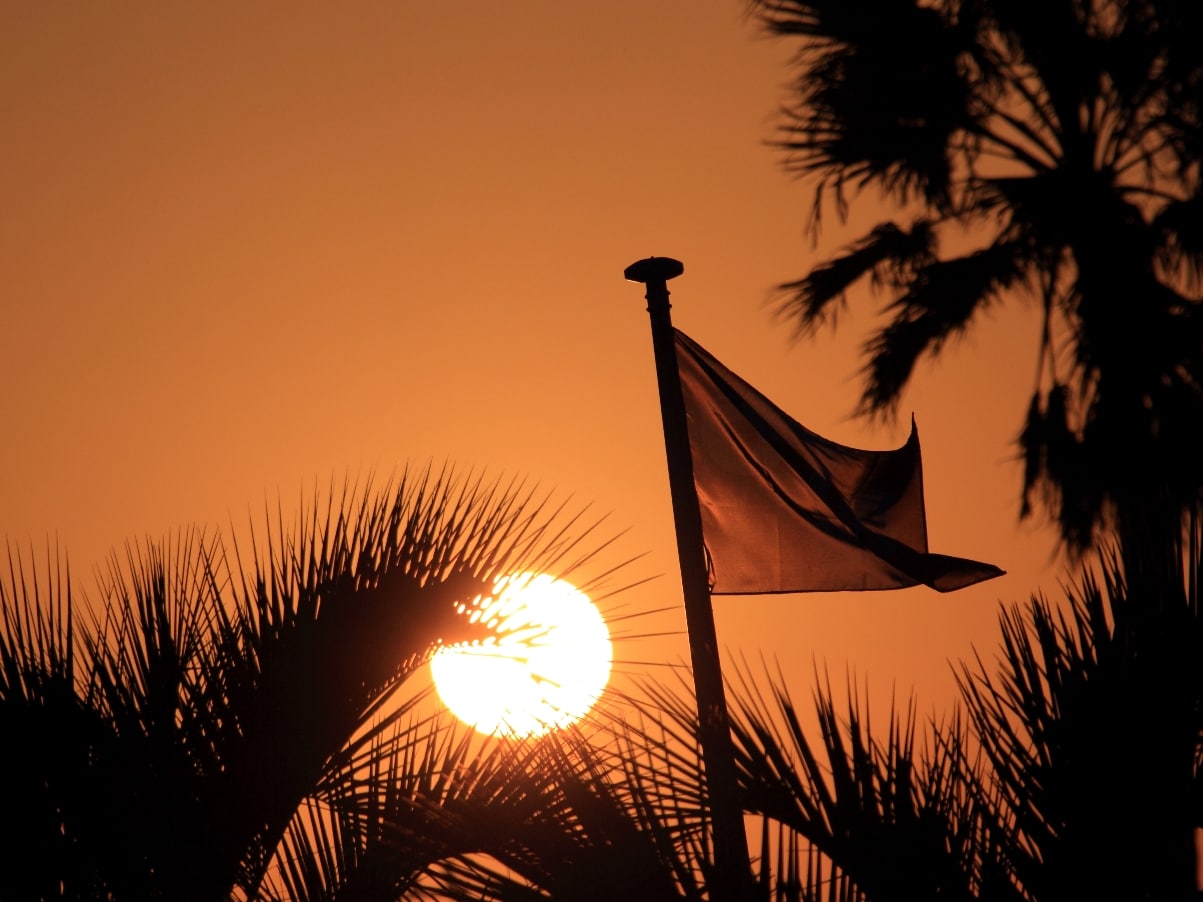Sunset and opa flag
