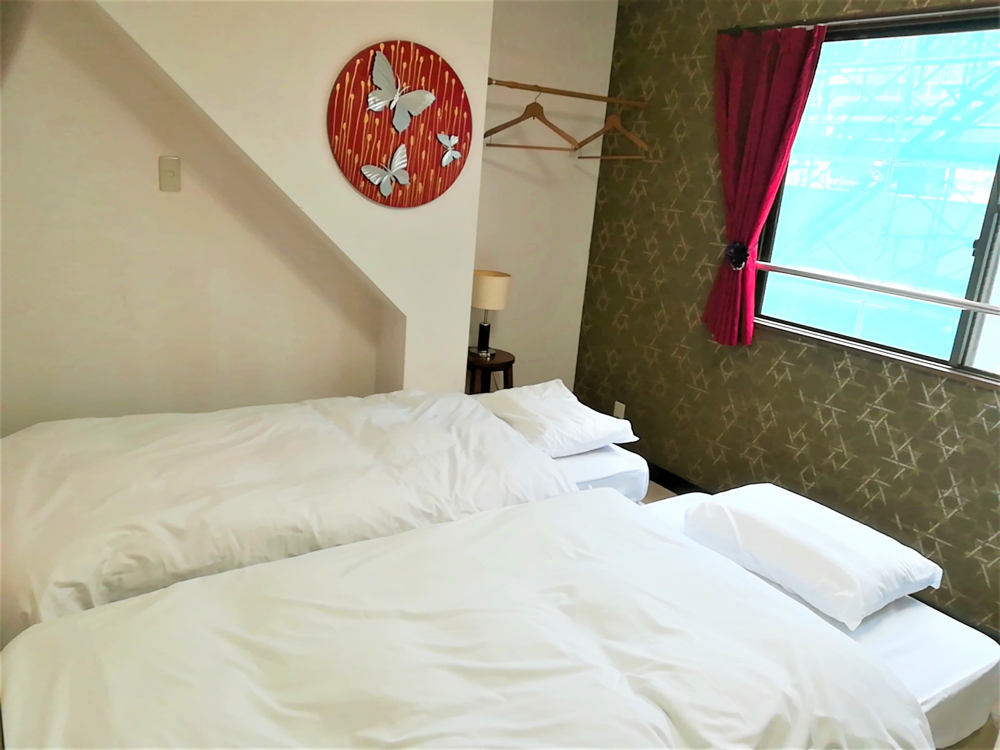 Kamar dengan Tempat Tidur Kembar