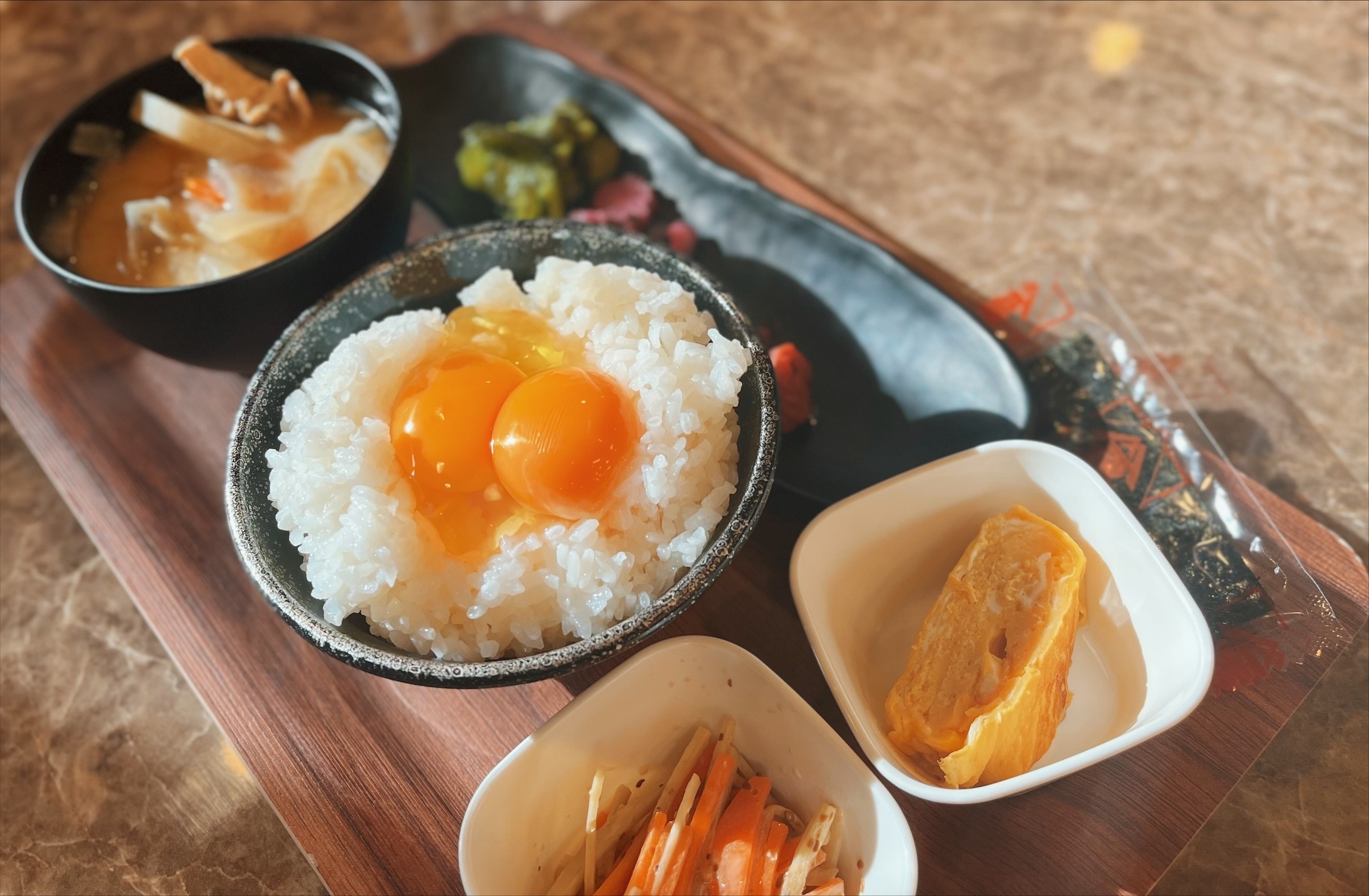 Breakfast: Pork miso soup and raw egg on rice