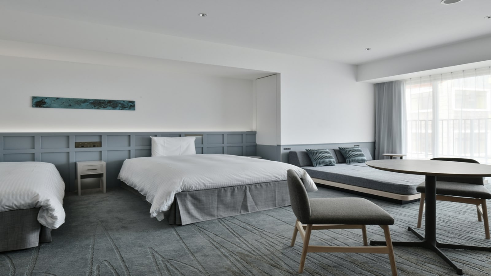 Junior suite in the main building, two 140cm width beds (extra sofa width 90cm), capacity 1-5 people
