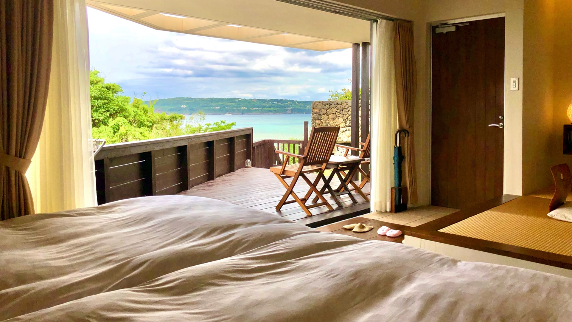 Empty room overlooking the sea from the bed