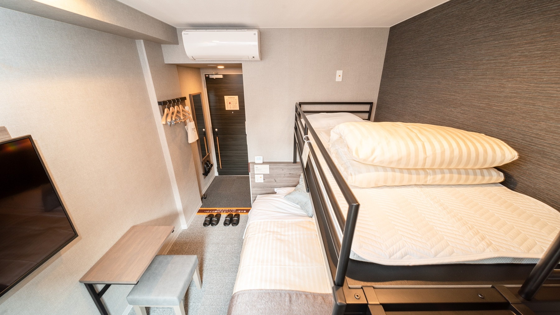 Change things up and try a bunk bed! Decide together which side you'll sleep on top of the other.