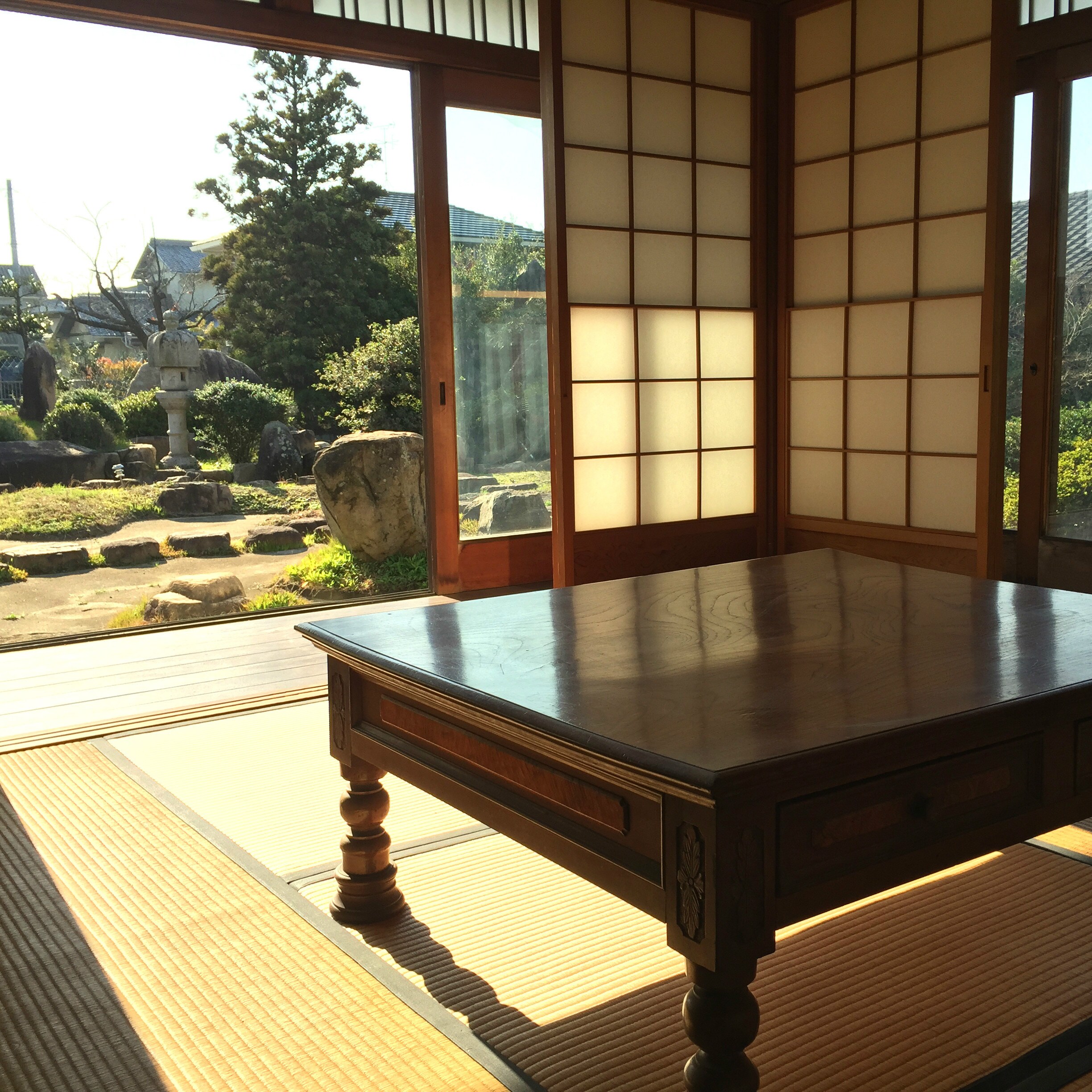 The shared space overlooks the Japanese garden.