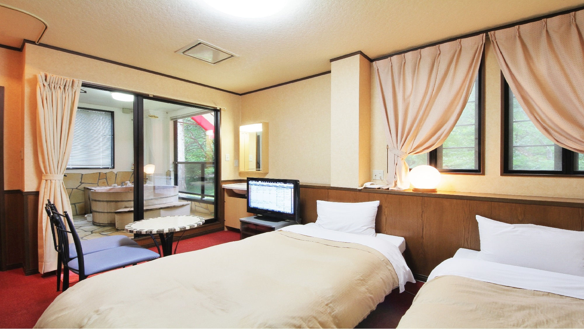 An example of a guest room with a terrace and open-air bath