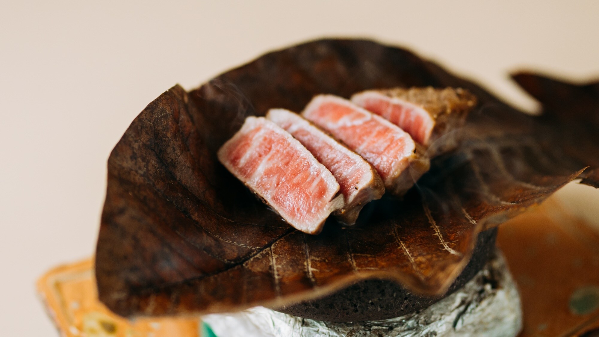 Amakusa black beef grilled on a magnolia leaf